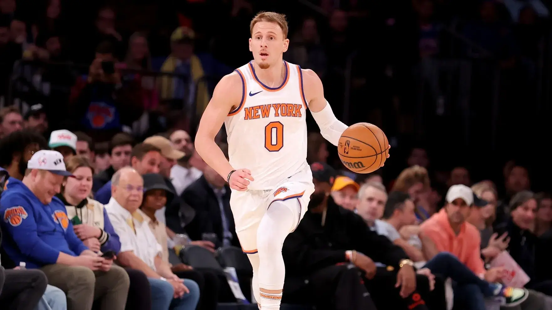 New York Knicks guard Donte DiVincenzo (0) brings the ball up court against the Washington Wizards during the first quarter. / Brad Penner-USA TODAY Sports