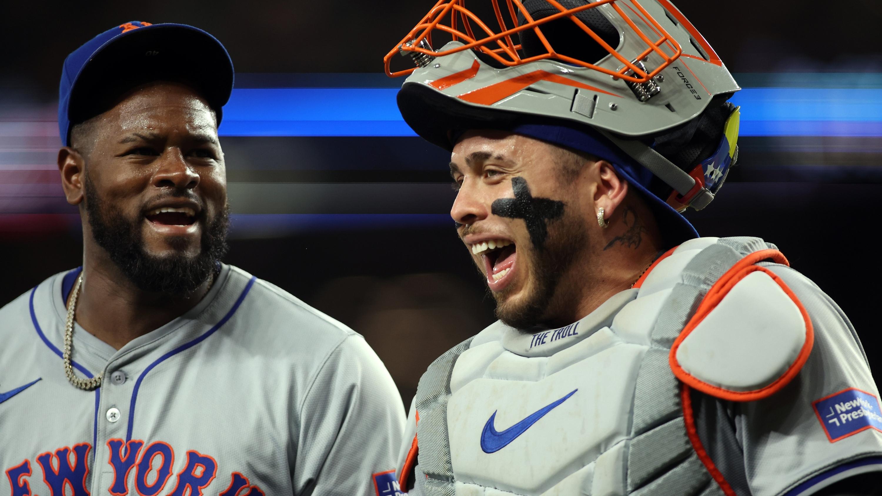 Jun 18, 2024; Arlington, Texas, USA; New York Mets pitcher Luis Severino (40) (L) and catcher Francisco Alvarez (4) walk off the field in the fifth inning against the Texas Rangers at Globe Life Field. 