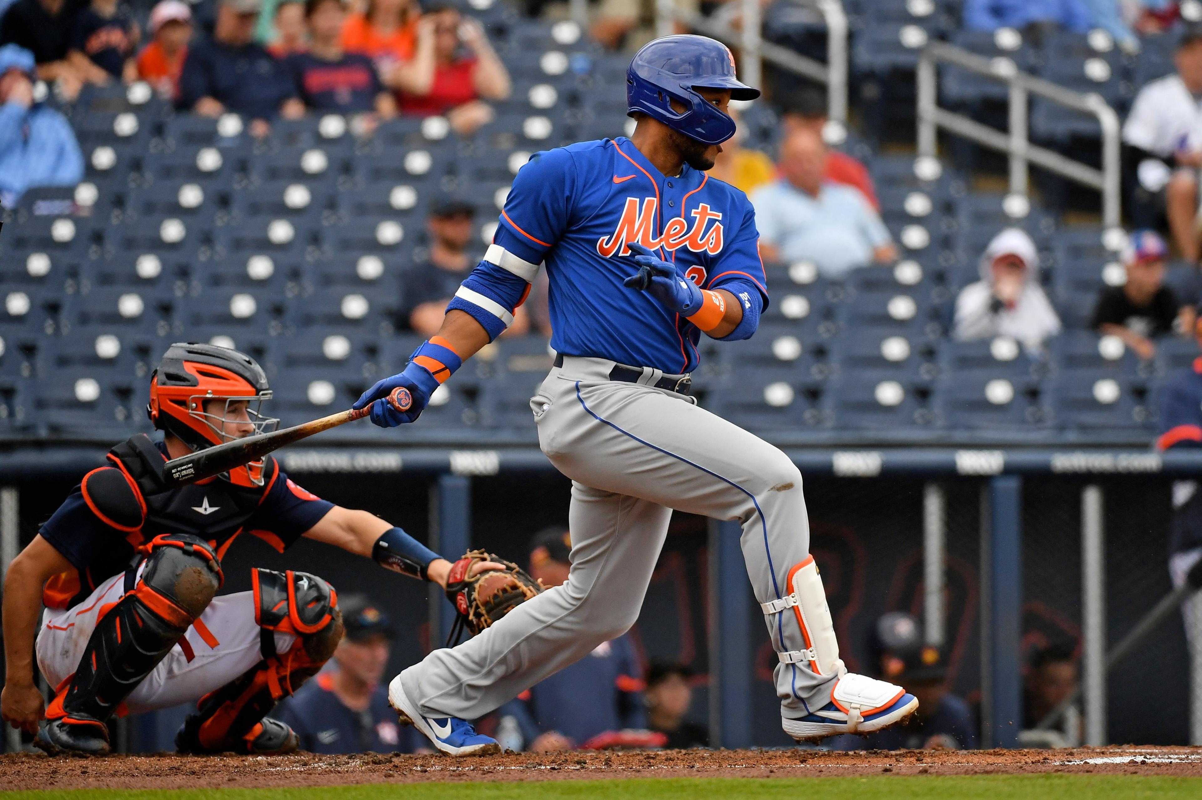 Mar 10, 2020; West Palm Beach, Florida, USA; New York Mets second baseman Robinson Cano (24) singles in two runs in the second inning of the spring training game against the Houston Astros at FITTEAM Ballpark of the Palm Beaches. Mandatory Credit: Jasen Vinlove-USA TODAY Sports