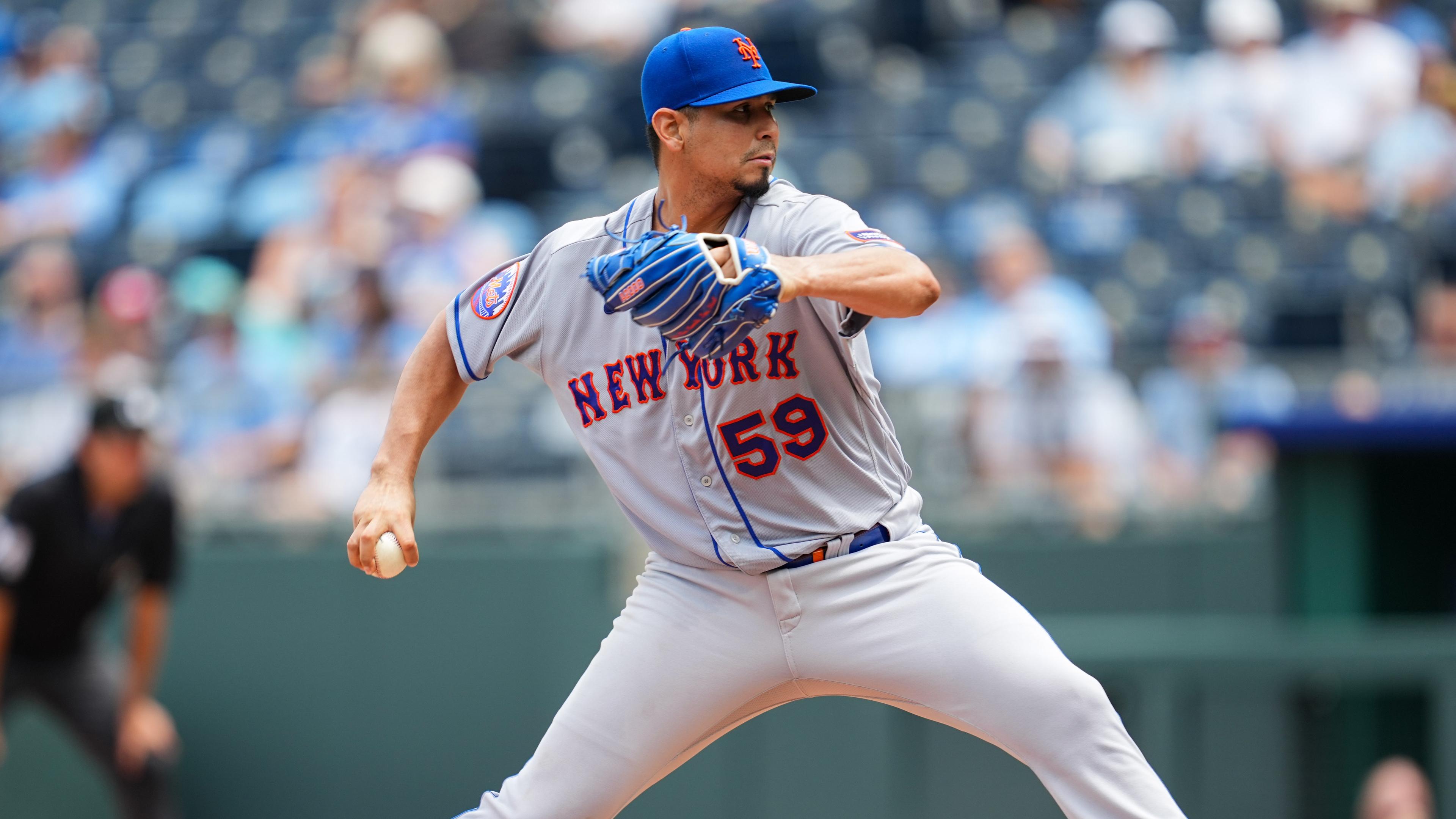 New York Mets starting pitcher Carlos Carrasco (59) pitches during the fifth inning against the Kansas City Royals at Kauffman Stadium