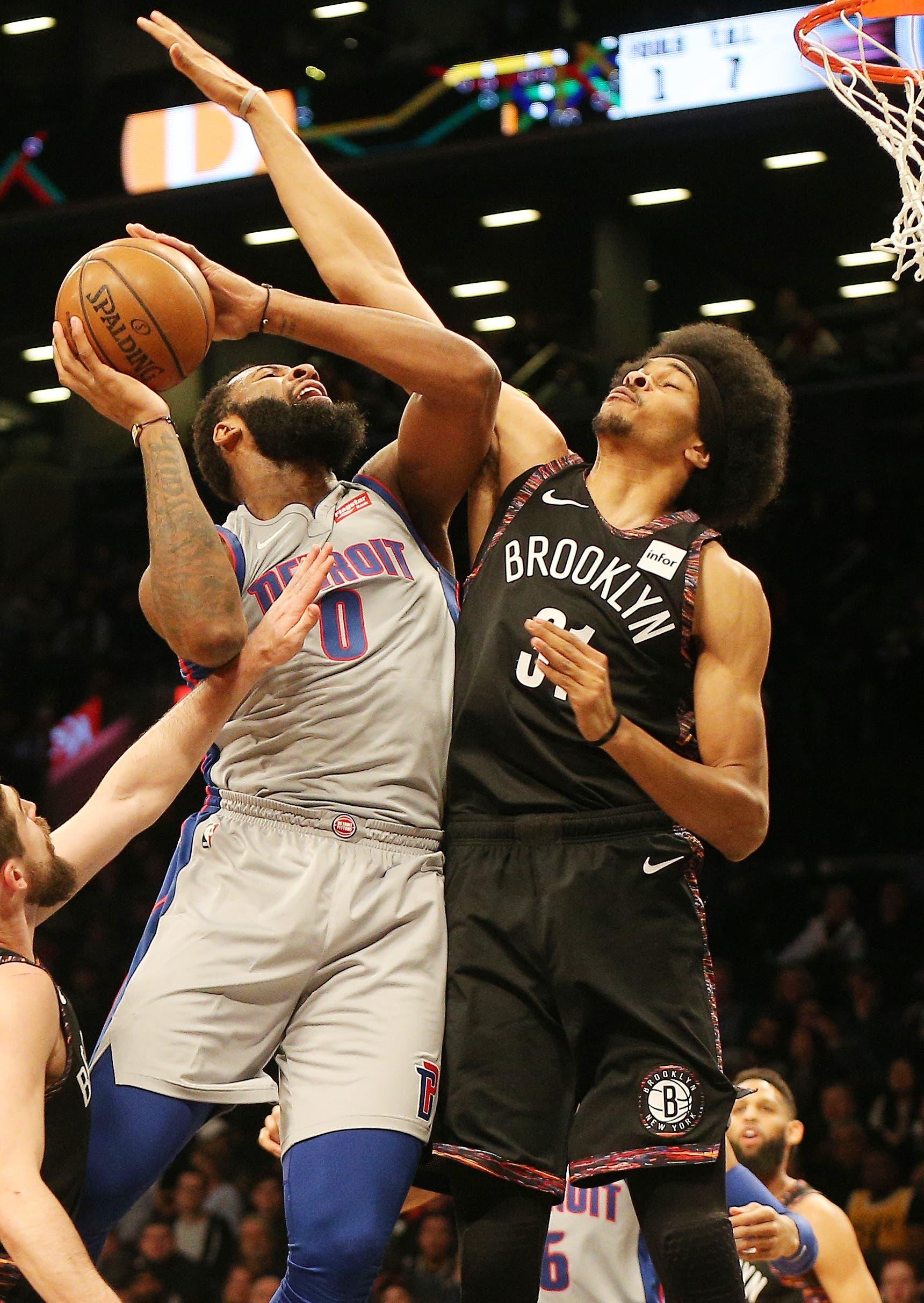 Detroit Pistons center Andre Drummond goes up for a shot against Brooklyn Nets center Jarrett Allen during the first half at Barclays Center. / Andy Marlin/USA TODAY Sports