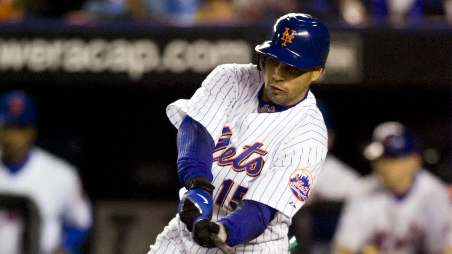 Oct 18, 2006; Flushing, NY, USA; New York Mets center fielder (15) Carlos Beltran singles in the fourth inning of game six of the National League Championship Series against the St. Louis Cardinals at Shea Stadium in Flushing, NY. / Howard Smith-USA TODAY Sports Copyright © 2006 Howard Smith