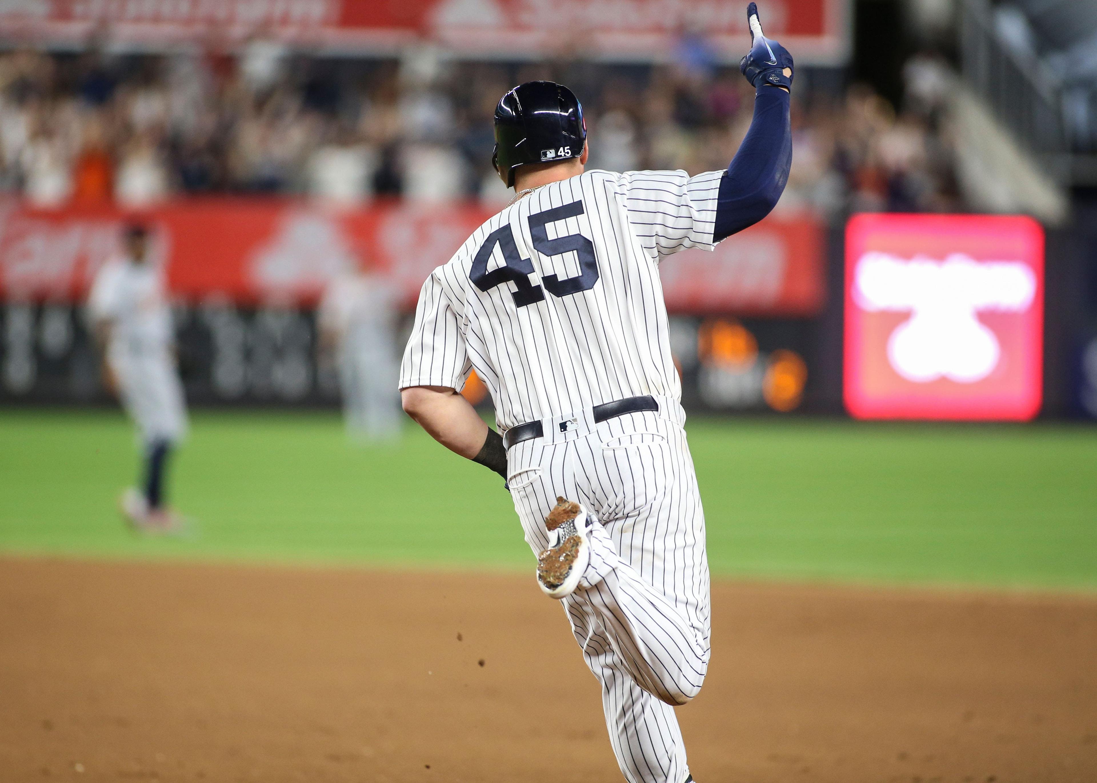 Aug 30, 2018; Bronx, NY, USA; New York Yankees first baseman Luke Voit (45) hits a two run home run in the seventh inning against the Detroit Tigers at Yankee Stadium. Mandatory Credit: Wendell Cruz-USA TODAY Sports / Wendell Cruz