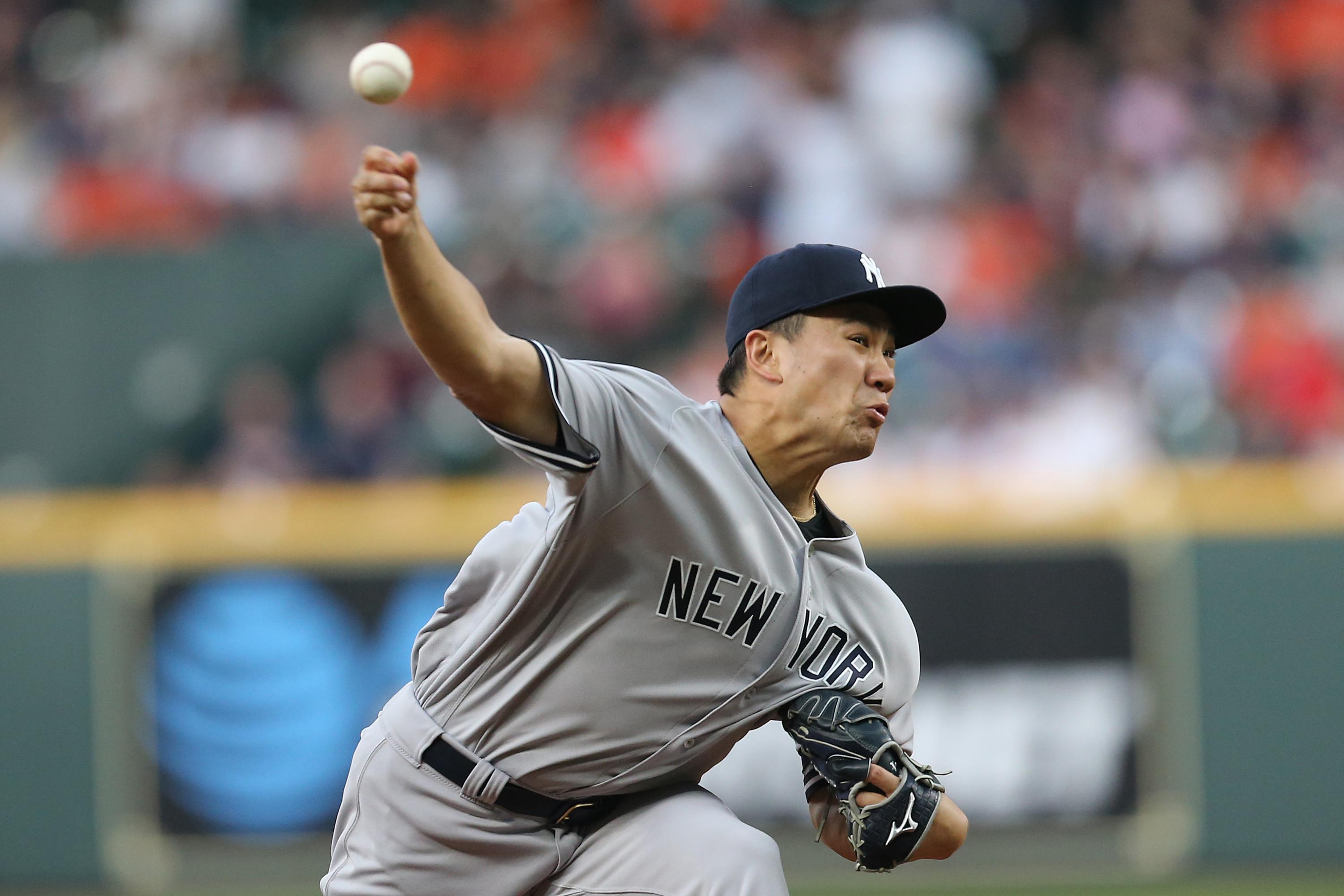 Apr 8, 2019; Houston, TX, USA; New York Yankees starting pitcher Masahiro Tanaka (19) pitches against the Houston Astros in the fourth inning at Minute Maid Park. Mandatory Credit: Thomas B. Shea-USA TODAY Sports