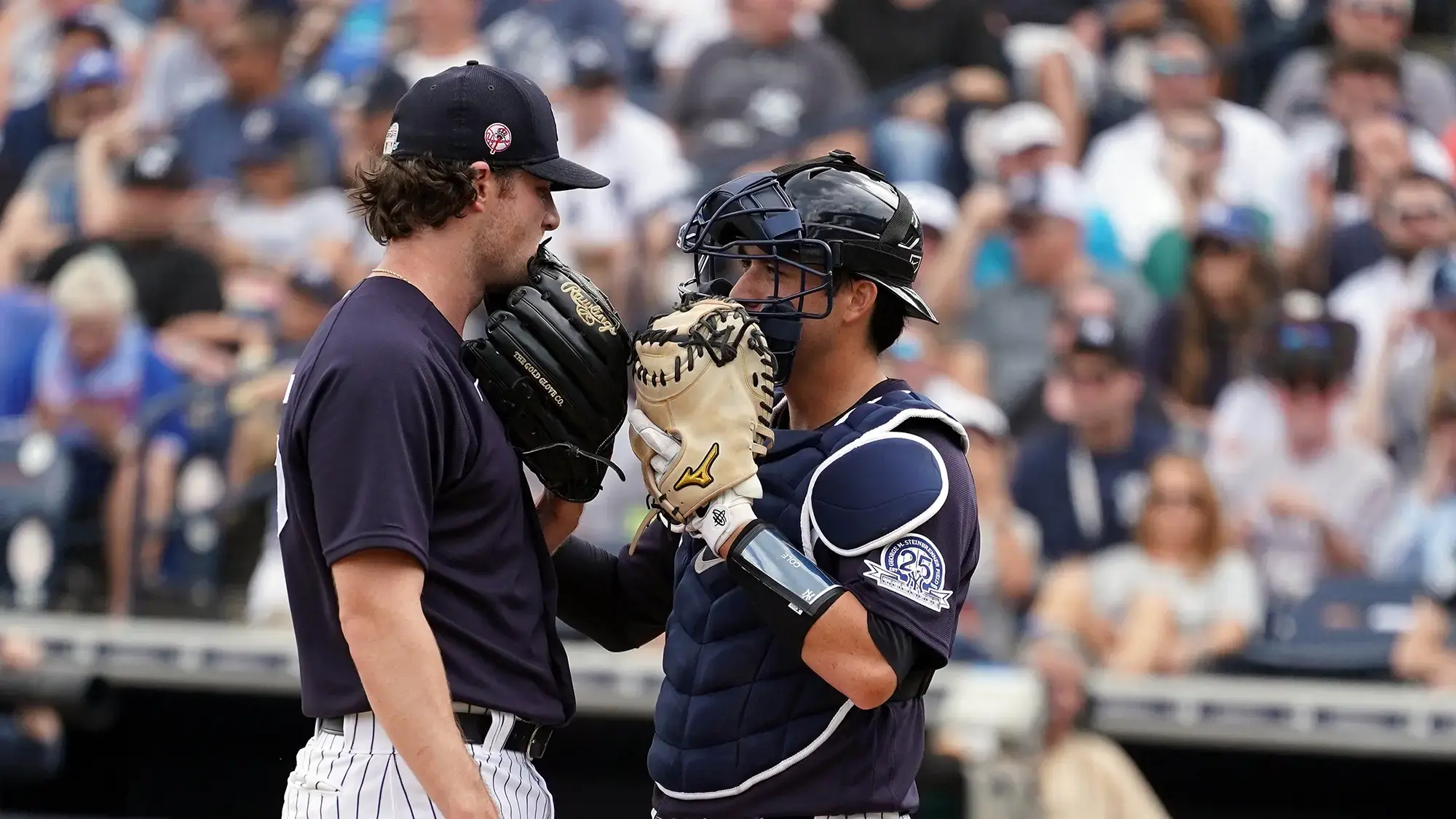 Mar 10, 2020; Tampa, Florida, USA; New York Yankees starting pitcher Gerrit Cole (45) talks with New York Yankees catcher Kyle Higashioka (66) at the mound against the Toronto Blue Jays during the second inning at George M. Steinbrenner Field / John David Mercer-USA TODAY Sports