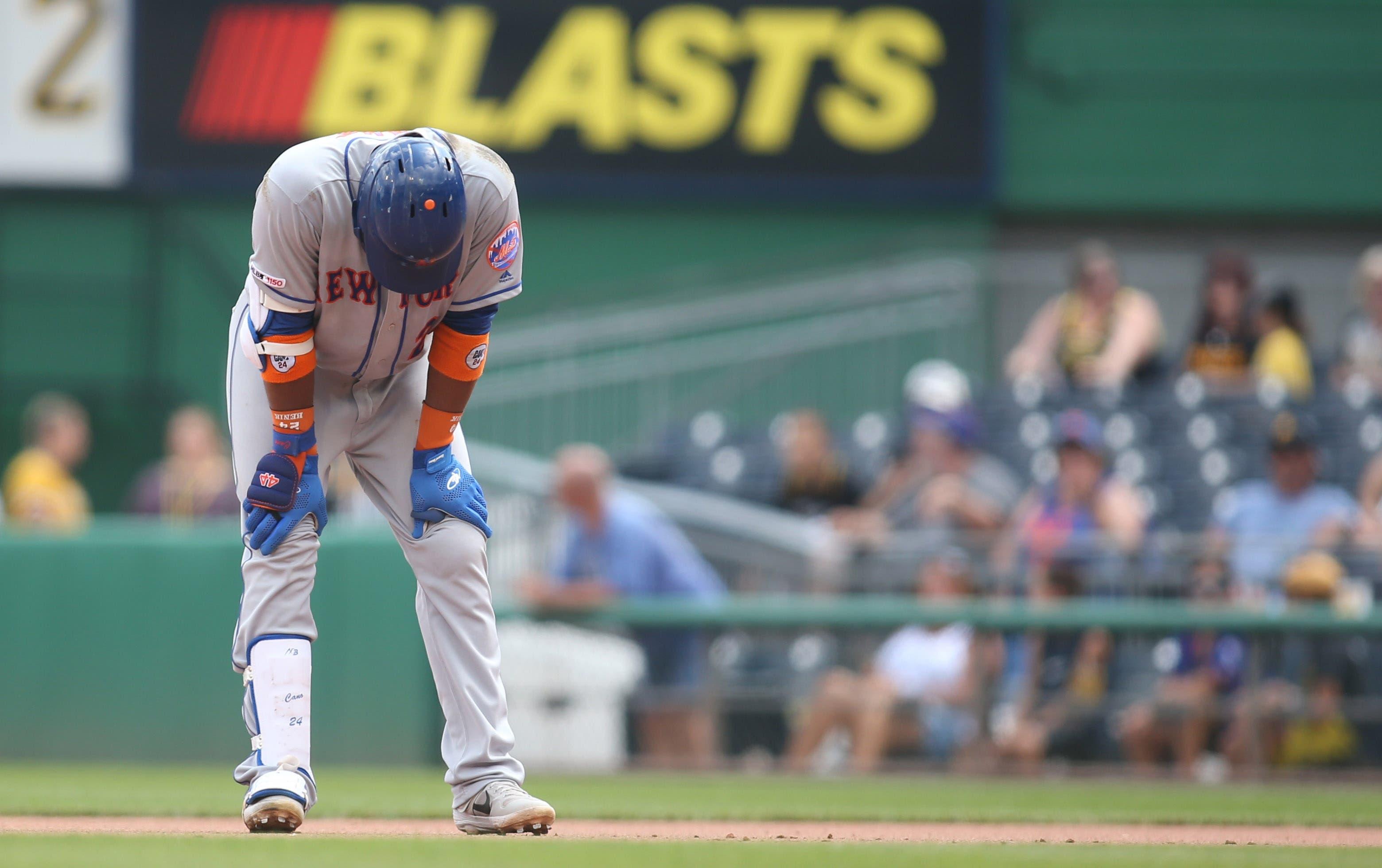 Aug 4, 2019; Pittsburgh, PA, USA; New York Mets second baseman Robinson Cano (24) reacts after suffering an apparent hamstring injury running the bases against the Pittsburgh Pirates during the fourth inning at PNC Park. Mandatory Credit: Charles LeClaire-USA TODAY Sports / Charles LeClaire