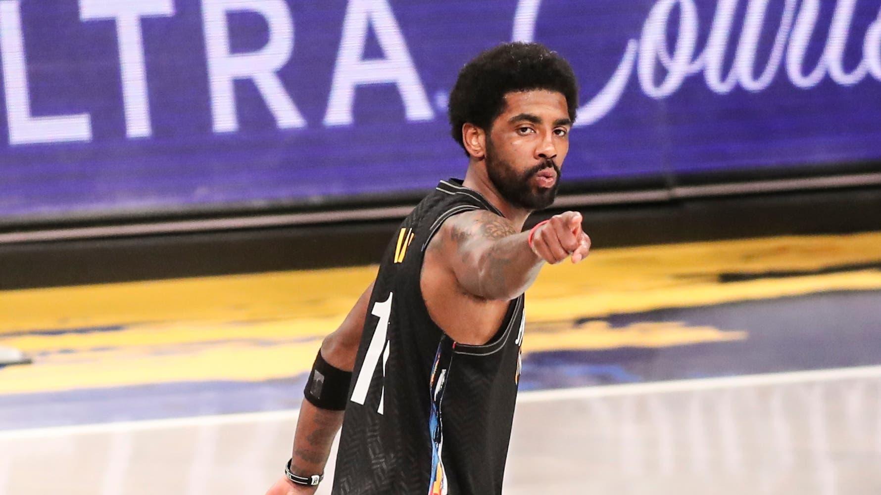 Jun 7, 2021; Brooklyn, New York, USA; Brooklyn Nets guard Kyrie Irving (11) points to the crowd after making a three point shot in the fourth quarter against the Milwaukee Bucks during game two in the second round of the 2021 NBA Playoffs. at Barclays Center. Mandatory Credit: Wendell Cruz-USA TODAY Sports / Wendell Cruz-USA TODAY Sports