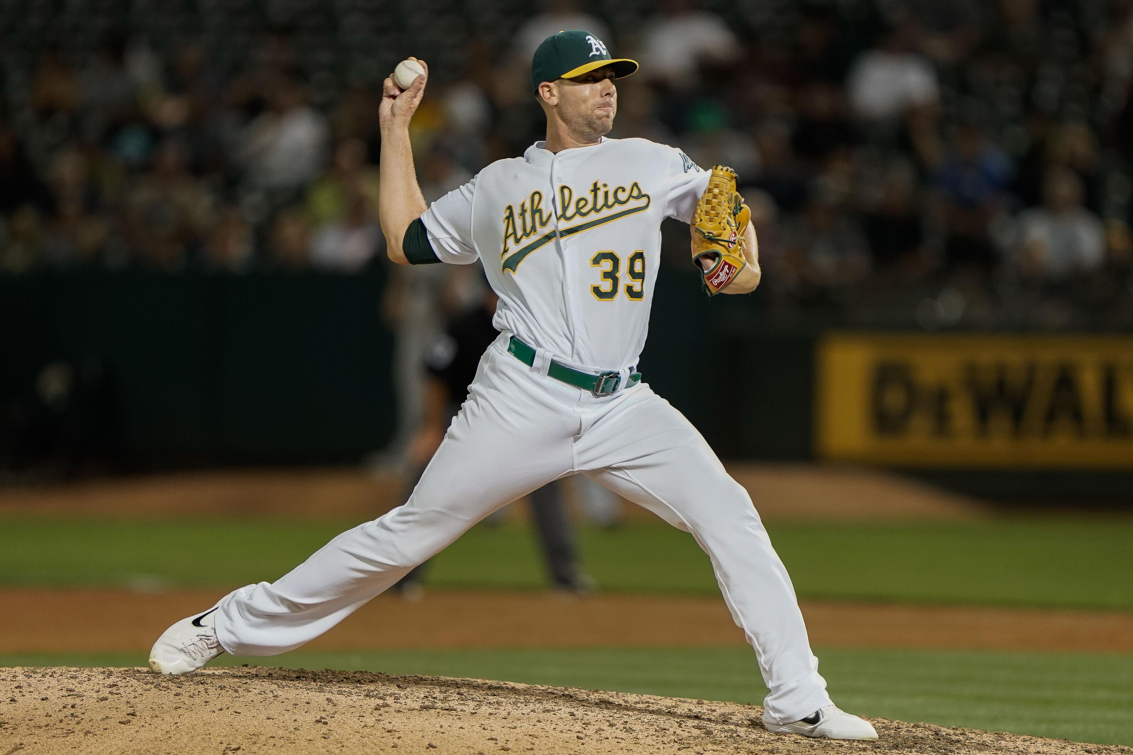 Aug 15, 2019; Oakland, CA, USA; Oakland Athletics relief pitcher Blake Treinen (39) pitches against the Houston Astros during the eighth inning at the Oakland Coliseum. Mandatory Credit: Stan Szeto-USA TODAY Sports