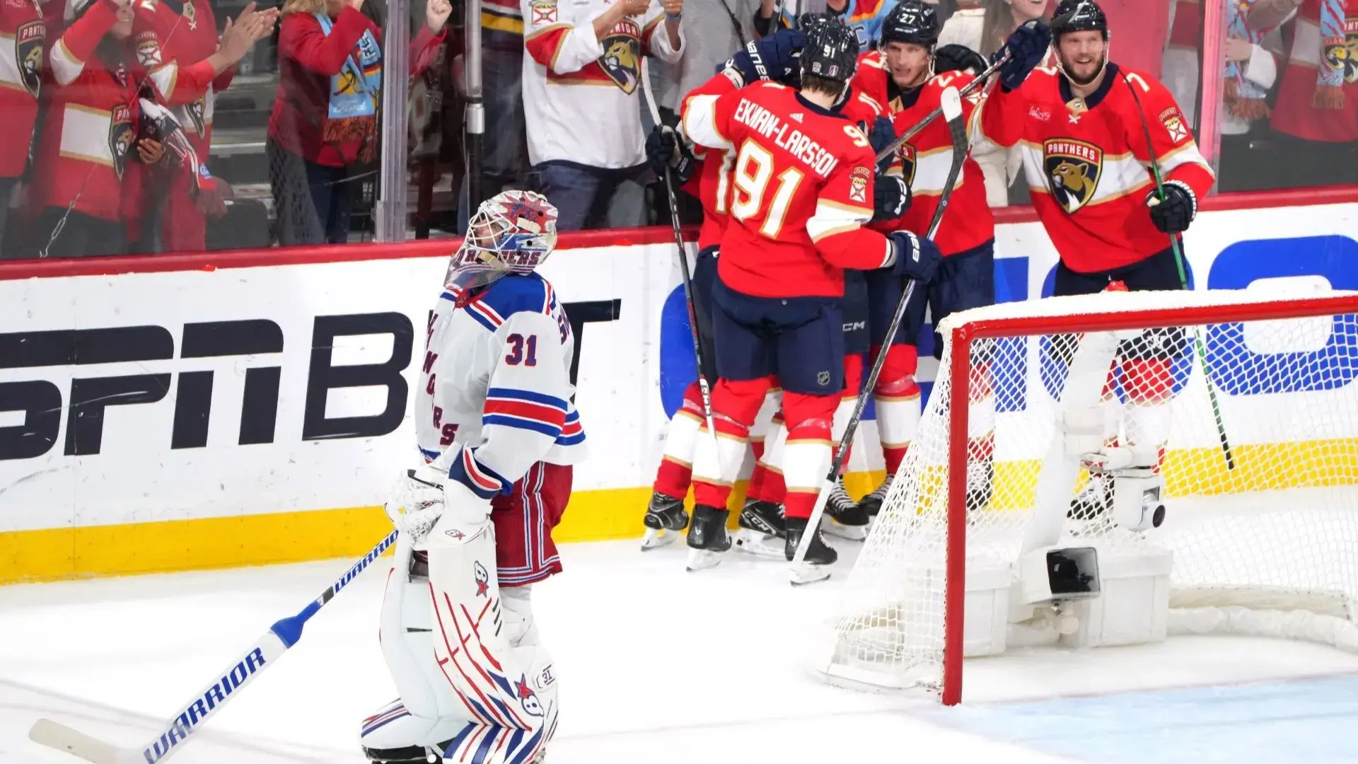 Jun 1, 2024; Sunrise, Florida, USA; Florida Panthers right wing Vladimir Tarasenko (10) celebrates a goal with teammates during the third period as New York Rangers goaltender Igor Shesterkin (31) looks on in game six of the Eastern Conference Final of the 2024 Stanley Cup Playoffs at Amerant Bank Arena. / Jim Rassol-USA TODAY Sports