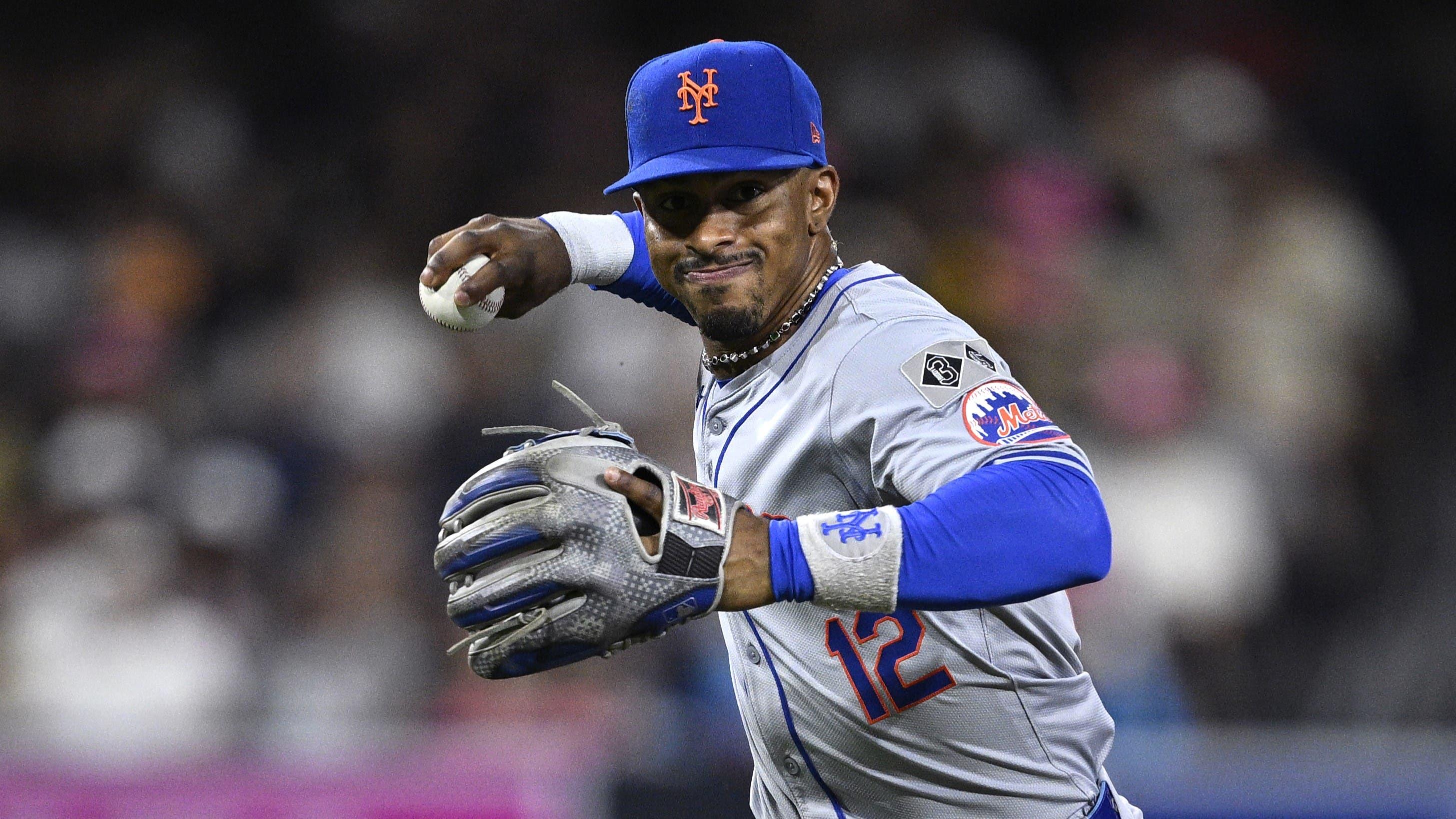 New York Mets shortstop Francisco Lindor (12) throws to first base during the sixth inning against the San Diego Padres at Petco Park. 