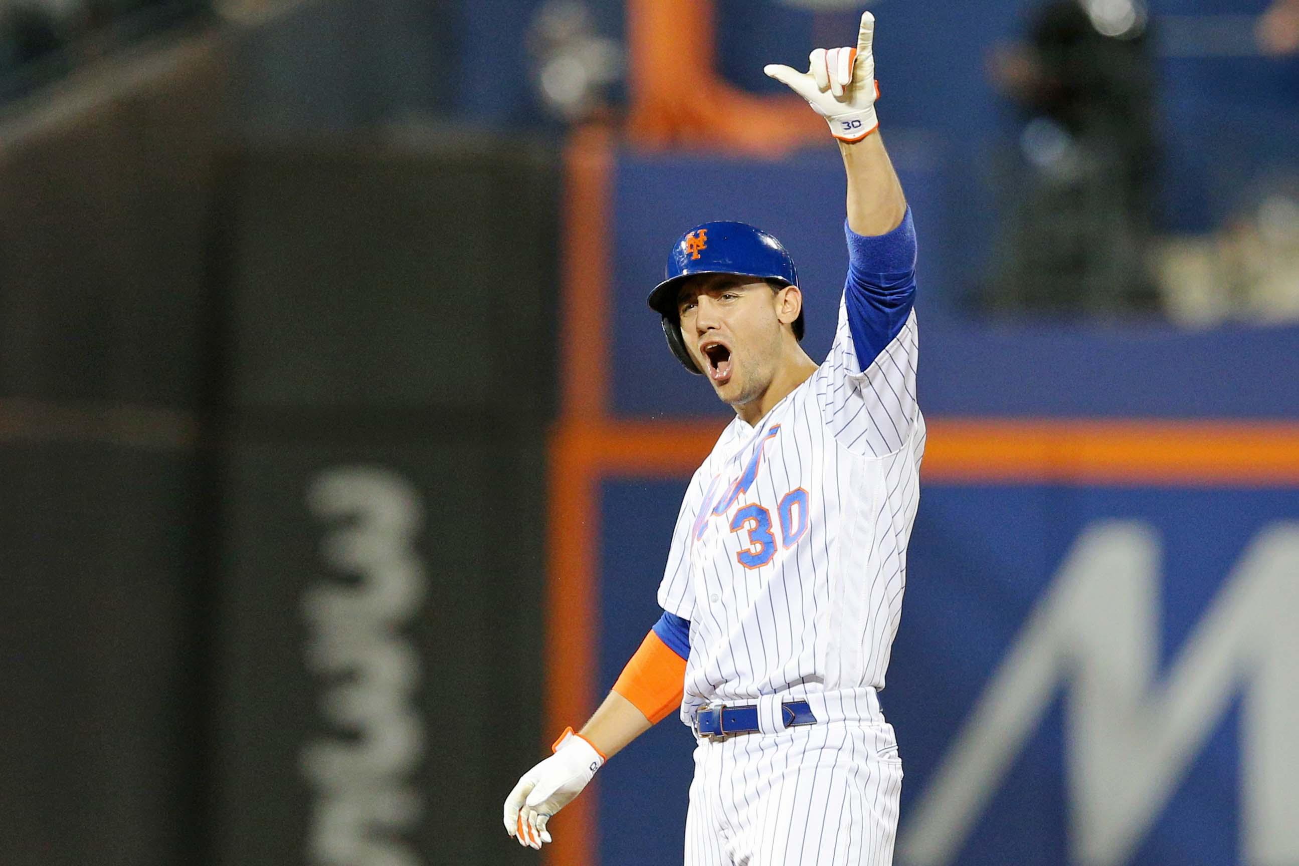 Jul 2, 2019; New York City, NY, USA; New York Mets center fielder Michael Conforto (30) reacts after hitting a two run RBI double against the New York Yankees during the eighth inning at Citi Field. Mandatory Credit: Brad Penner-USA TODAY Sports / Brad Penner