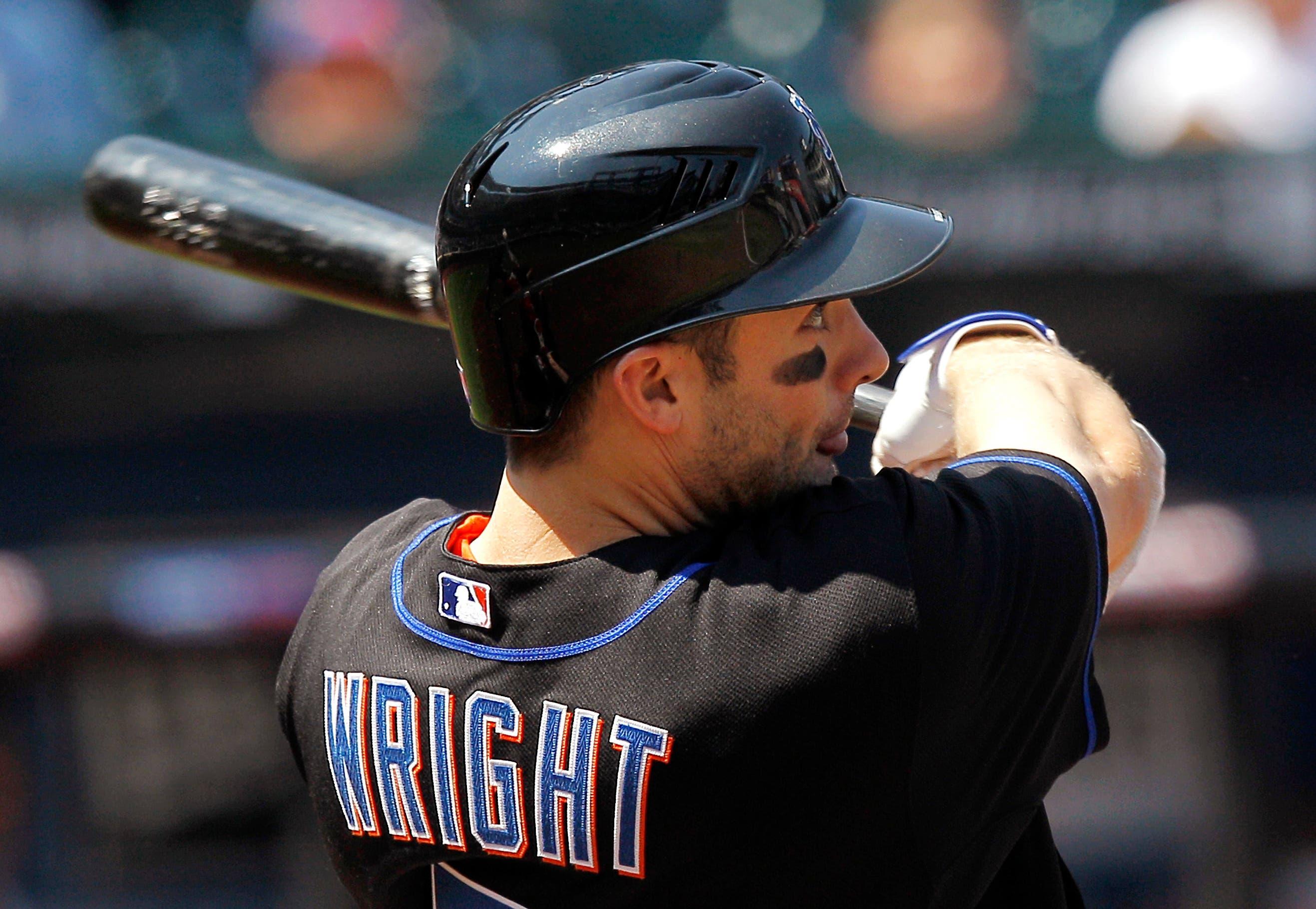 New York Mets' David Wright watches his two-run home run against the Arizona Diamondbacks in the first inning of a baseball game in New York, Sunday, April 24, 2011. (AP Photo/Paul J. Bereswill)undefined