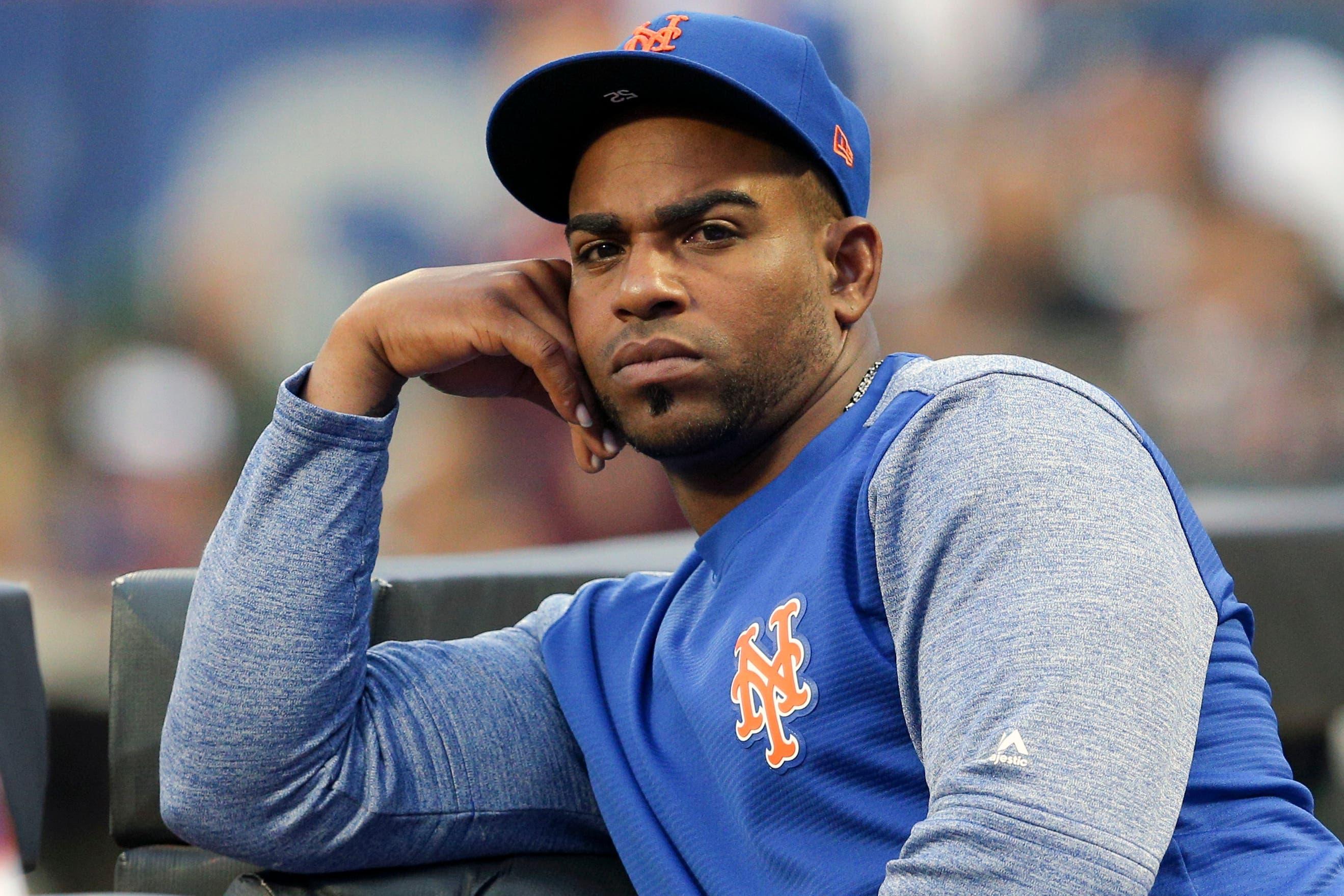 Jul 24, 2018; New York City, NY, USA; New York Mets injured left fielder Yoenis Cespedes (52) watches from the dugout during the first inning against the San Diego Padres at Citi Field. Mandatory Credit: Brad Penner-USA TODAY Sports / Brad Penner