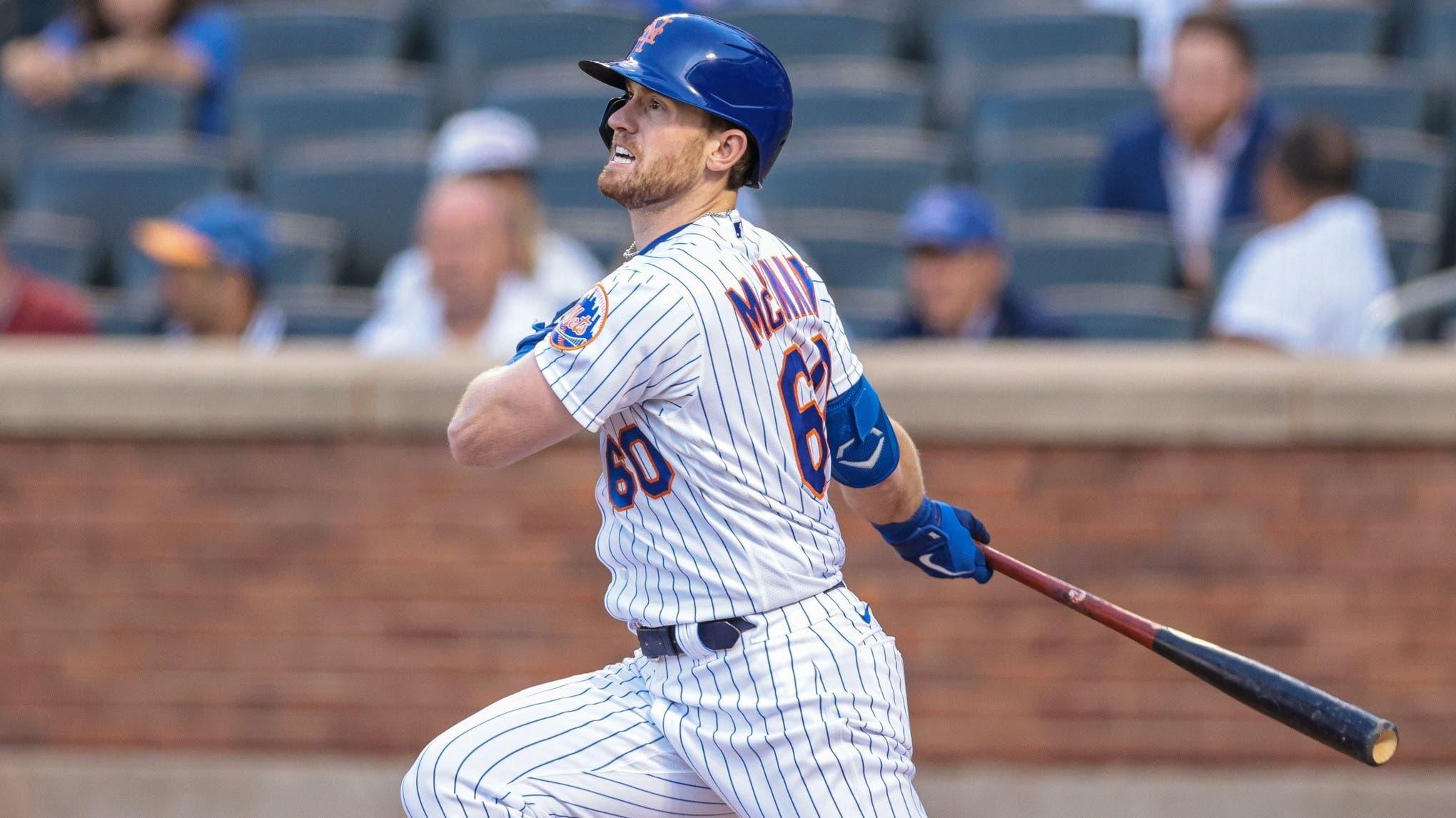 Jun 17, 2021; New York City, New York, USA; New York Mets right fielder Billy McKinney (60) follows through on a swing for a double during the second inning against the Chicago Cubs at Citi Field. / Vincent Carchietta-USA TODAY Sports