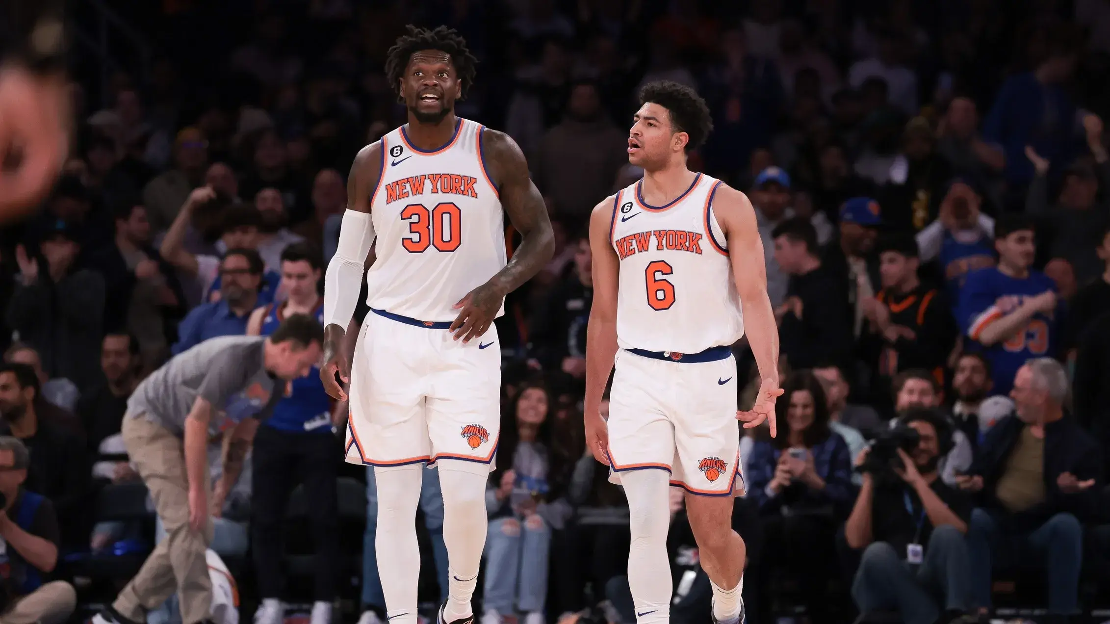 Mar 7, 2023; New York, New York, USA; New York Knicks forward Julius Randle (30) and guard Quentin Grimes (6) walk off the court after the first half against the Charlotte Hornets at Madison Square Garden. / Vincent Carchietta-USA TODAY Sports
