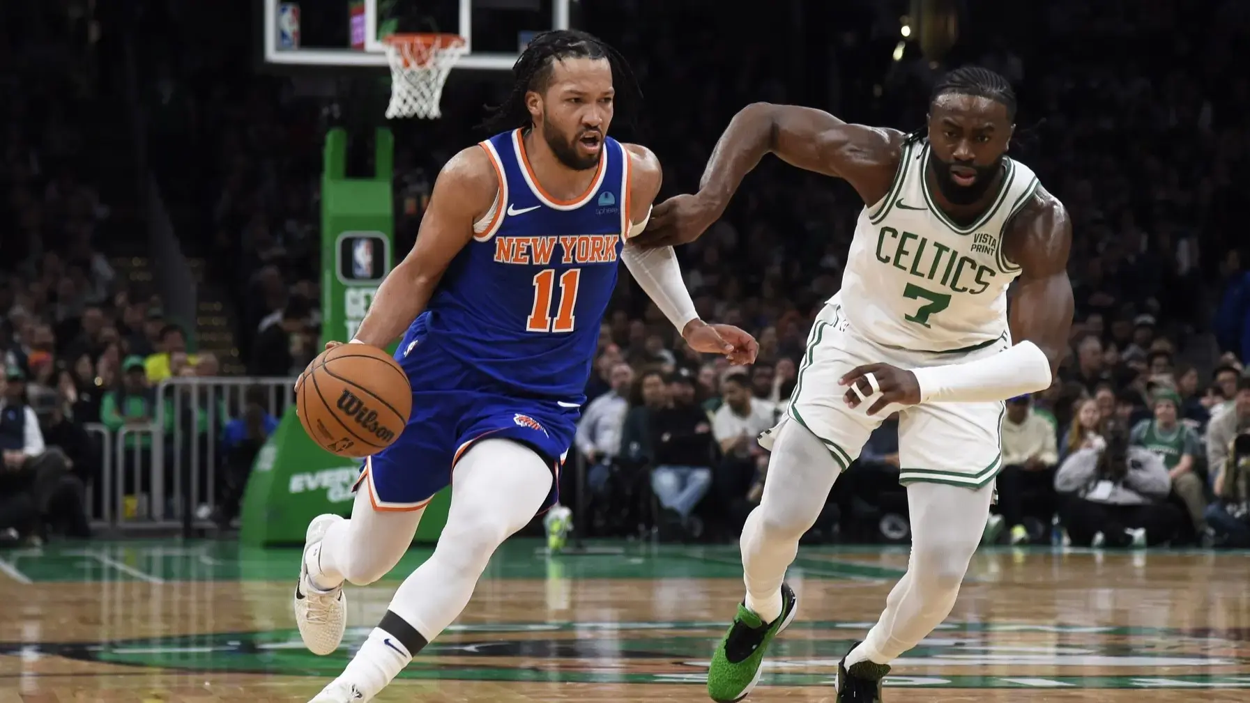 Apr 11, 2024; Boston, Massachusetts, USA; New York Knicks guard Jalen Brunson (11) controls the ball while Boston Celtics guard Jaylen Brown (7) defends during the first half at TD Garden. / Bob DeChiara-USA TODAY Sports