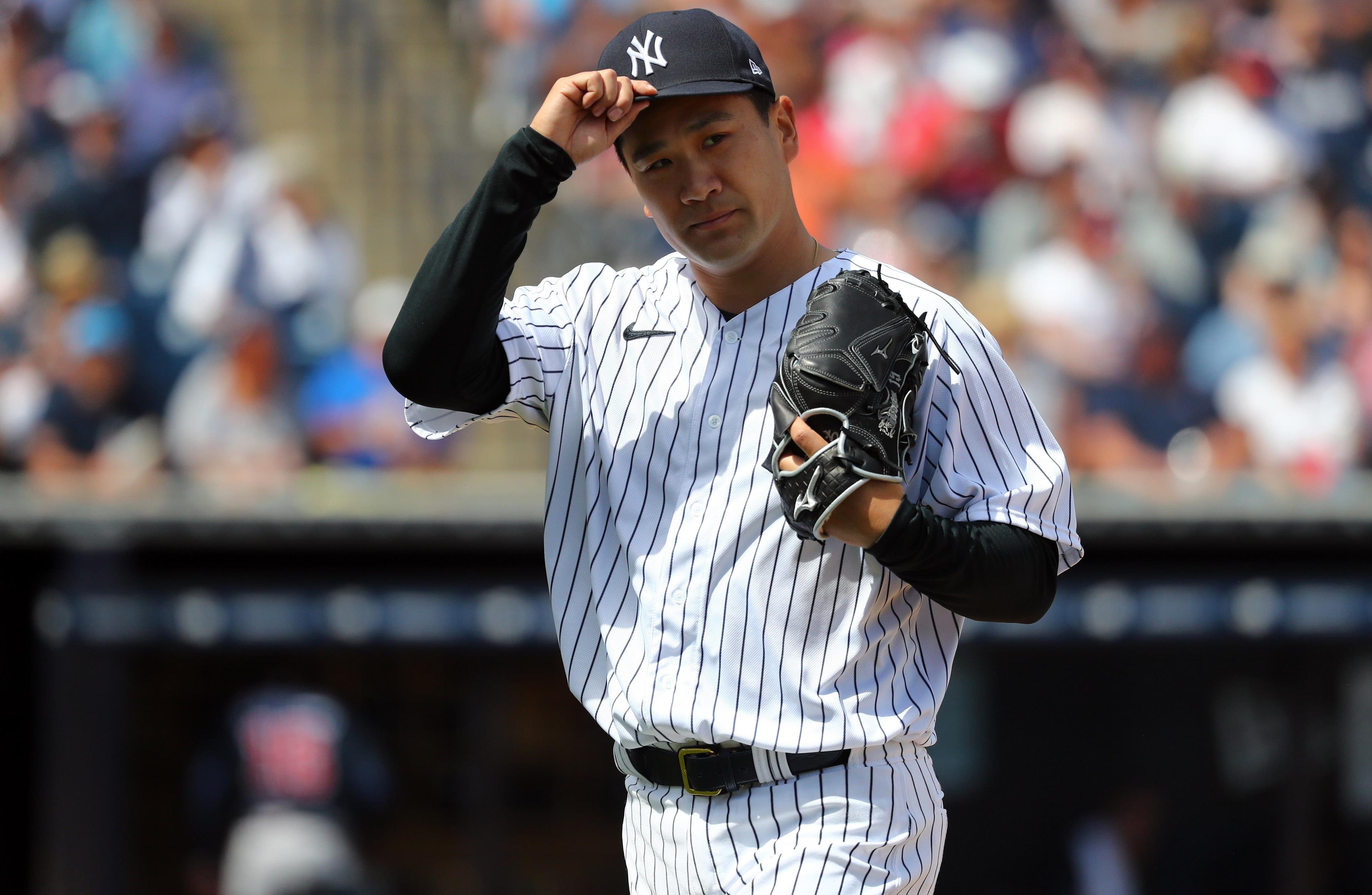 Mar 8, 2020; Tampa, Florida, USA; New York Yankees starting pitcher Masahiro Tanaka (19) tips his hat to the crowd as he is taken out during the fourth inning against the Atlanta Braves at George M. Steinbrenner Field. Mandatory Credit: Kim Klement-USA TODAY Sports / Kim Klement