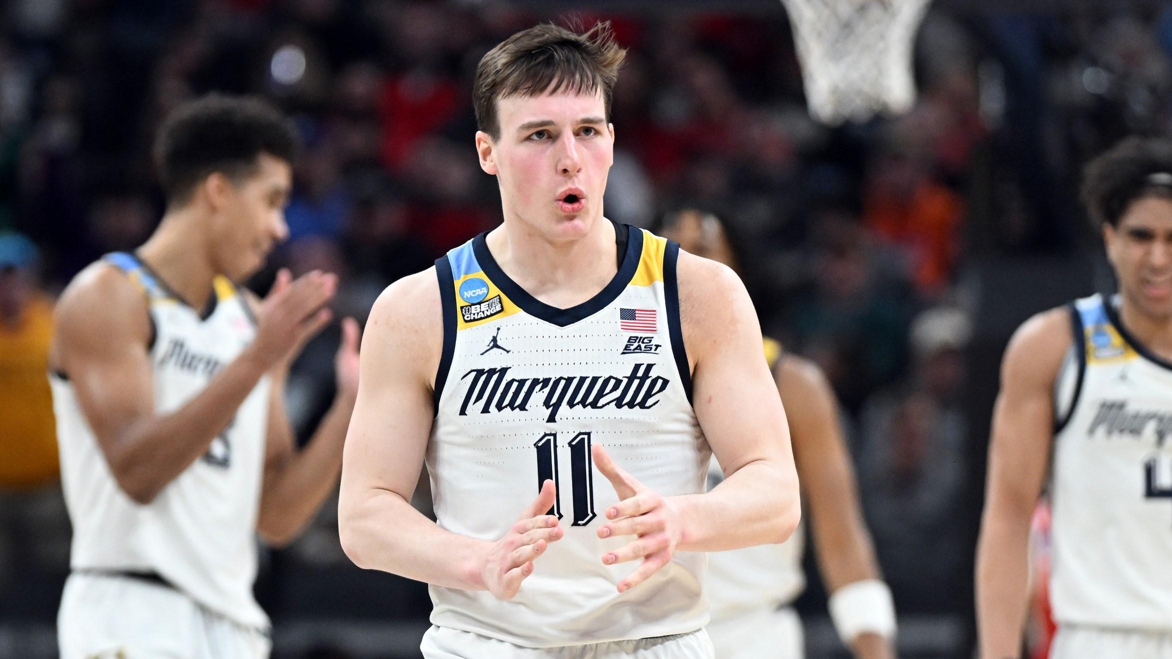Mar 22, 2024; Indianapolis, IN, USA; Marquette Golden Eagles guard Tyler Kolek (11) reacts in the second half against the Western Kentucky Hilltoppers in the first round of the 2024 NCAA Tournament at Gainbridge FieldHouse. 