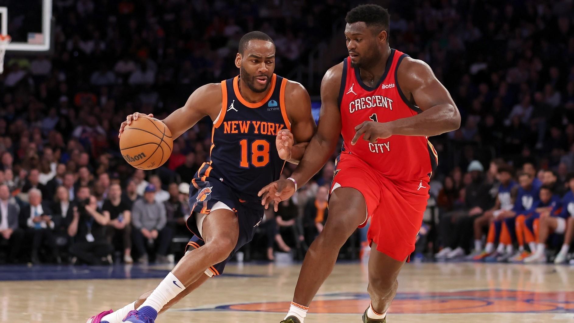 New York Knicks guard Alec Burks (18) drives to the basket against New Orleans Pelicans forward Zion Williamson (1) during the second quarter at Madison Square Garden.