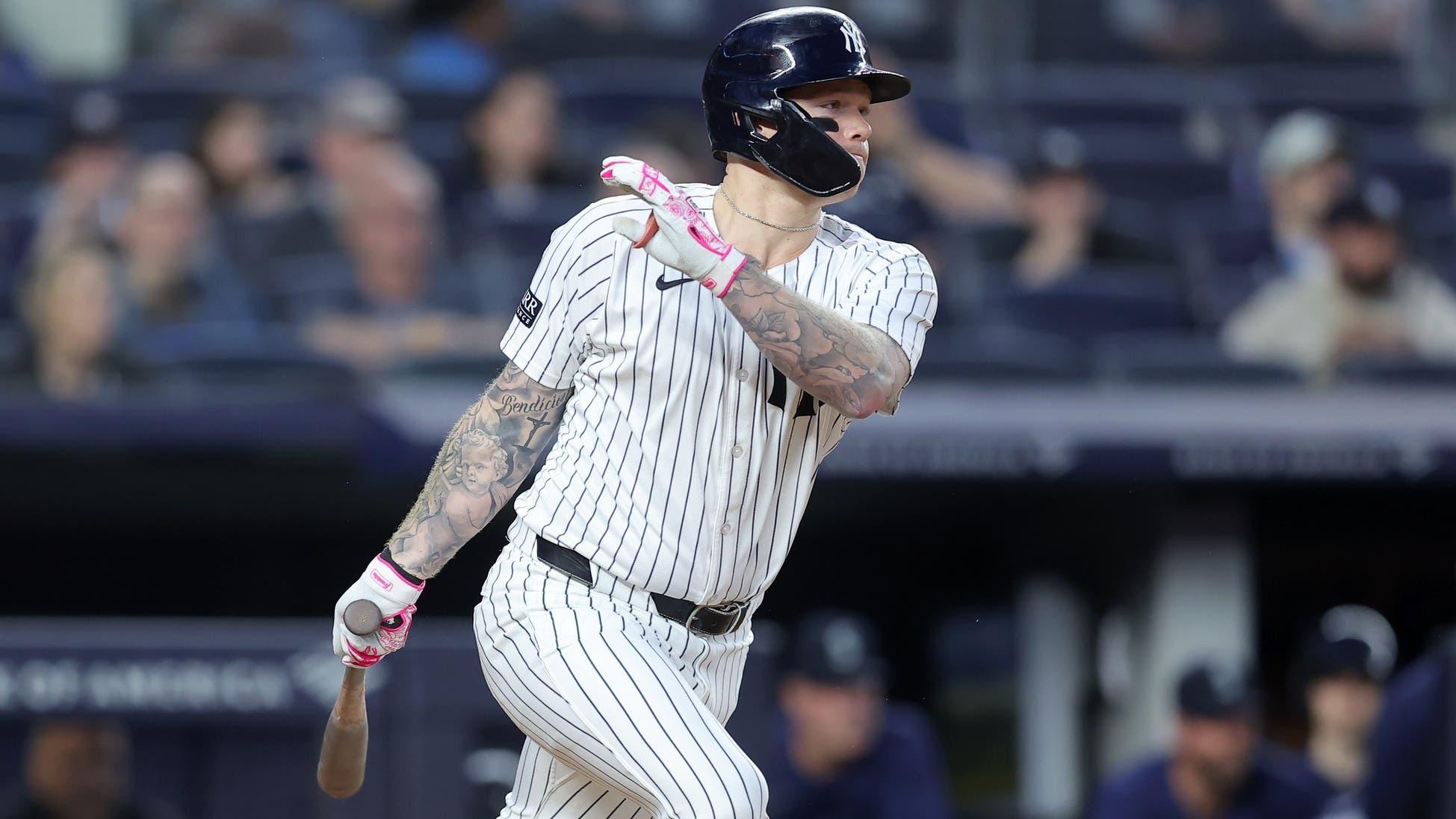 May 20, 2024; Bronx, New York, USA; New York Yankees left fielder Alex Verdugo (24) follows through on an RBI single against the Seattle Mariners during the fifth inning at Yankee Stadium. / Brad Penner-USA TODAY Sports