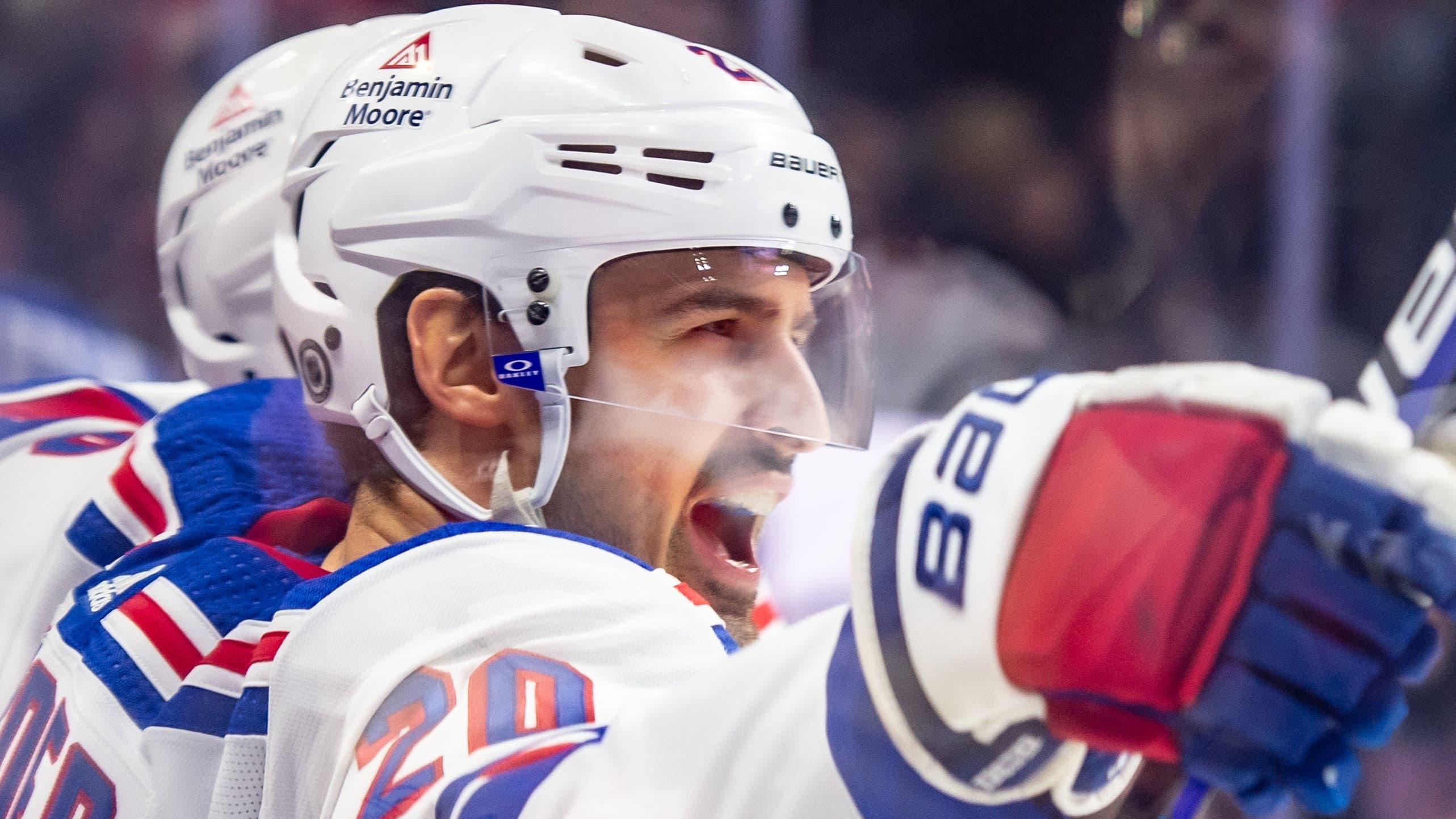 New York Rangers left wing Chris Kreider (20) celebrates his goal scored in the second period against the Ottawa Senators at the Canadian Tire Centre / Mark DesRosiers - USA TODAY Sports