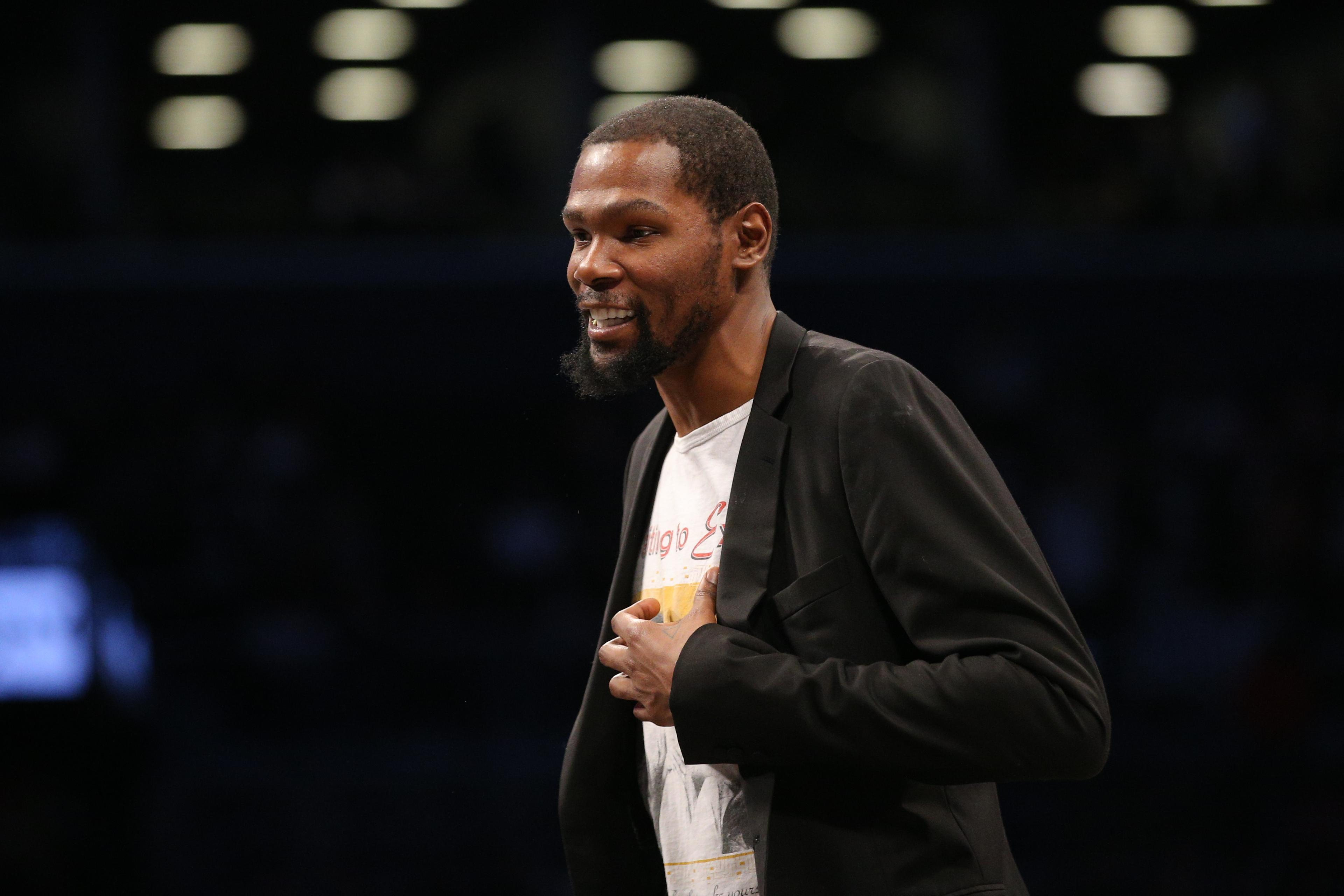 Feb 3, 2020; Brooklyn, New York, USA; Brooklyn Nets small forward Kevin Durant (7) smiles during a time out during the second quarter against the Phoenix Suns at Barclays Center. Mandatory Credit: Brad Penner-USA TODAY Sports