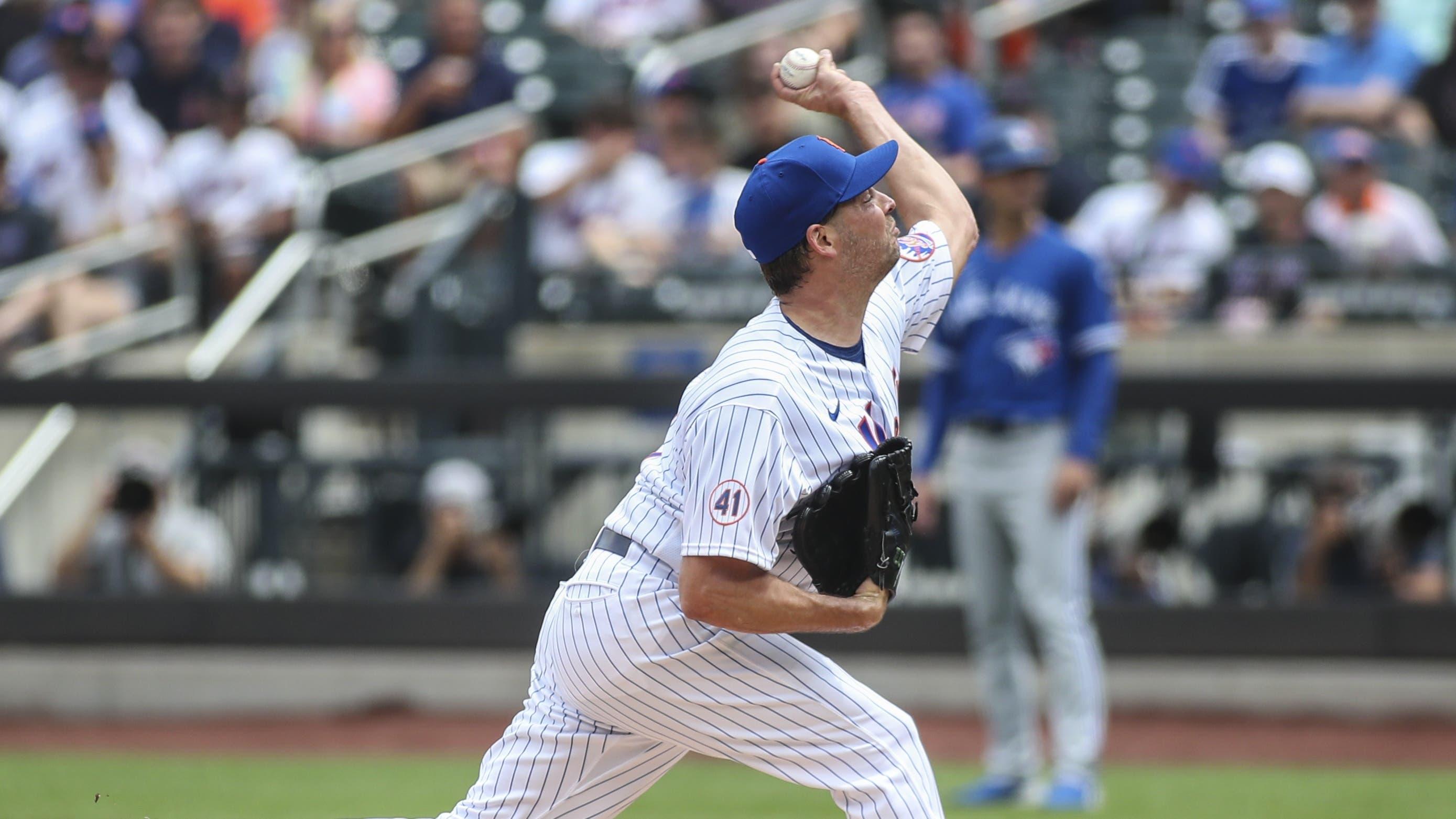 Jul 25, 2021; New York City, New York, USA; New York Mets pitcher Rich Hill (14) pitches in the first inning against the Toronto Blue Jays at Citi Field. / © Wendell Cruz-USA TODAY Sports