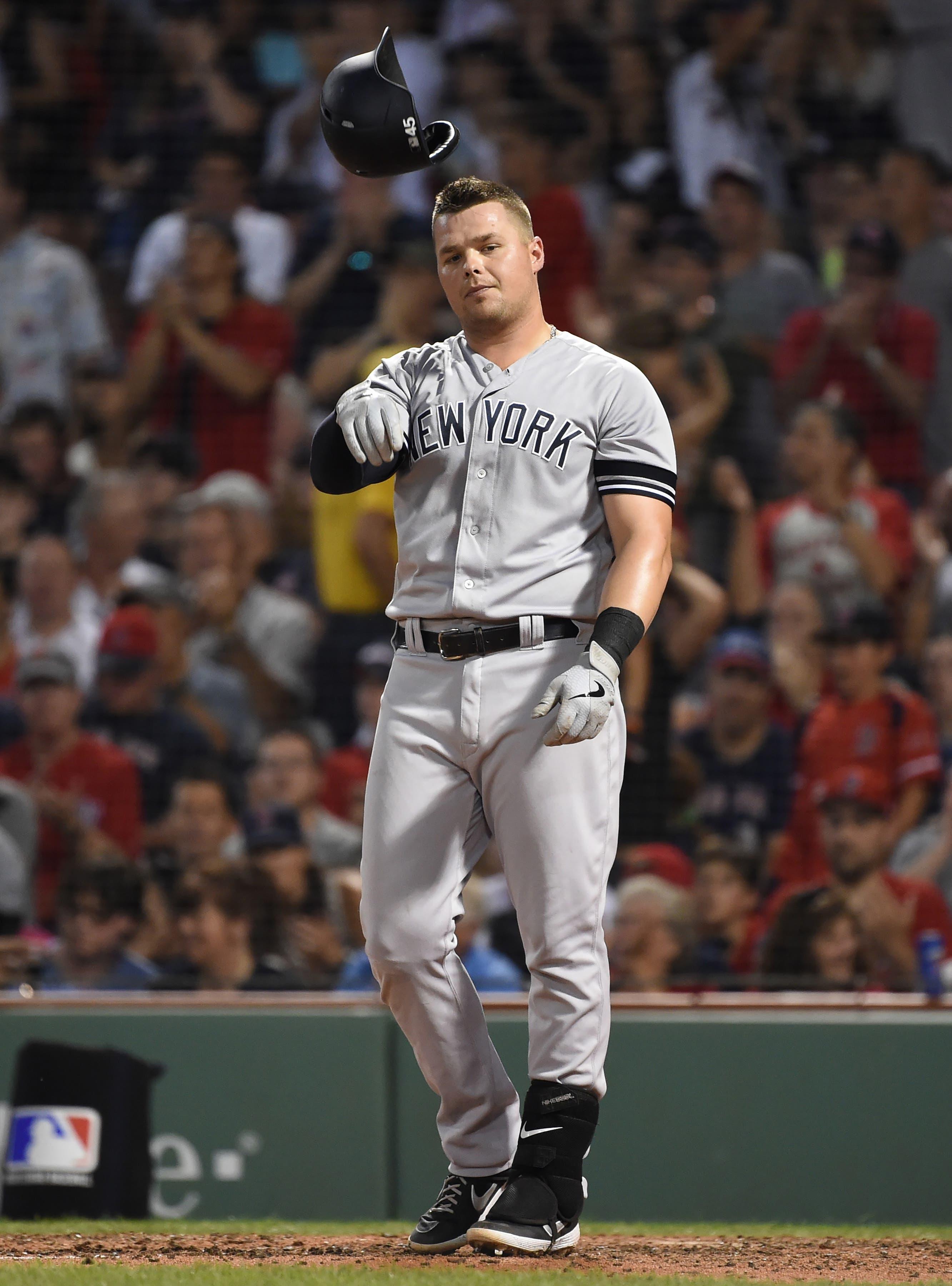 Jul 28, 2019; Boston, MA, USA; New York Yankees first baseman Luke Voit (45) throws his helmet after striking out during the fourth inning against the Boston Red Sox at Fenway Park. Mandatory Credit: Bob DeChiara-USA TODAY Sports / Bob DeChiara