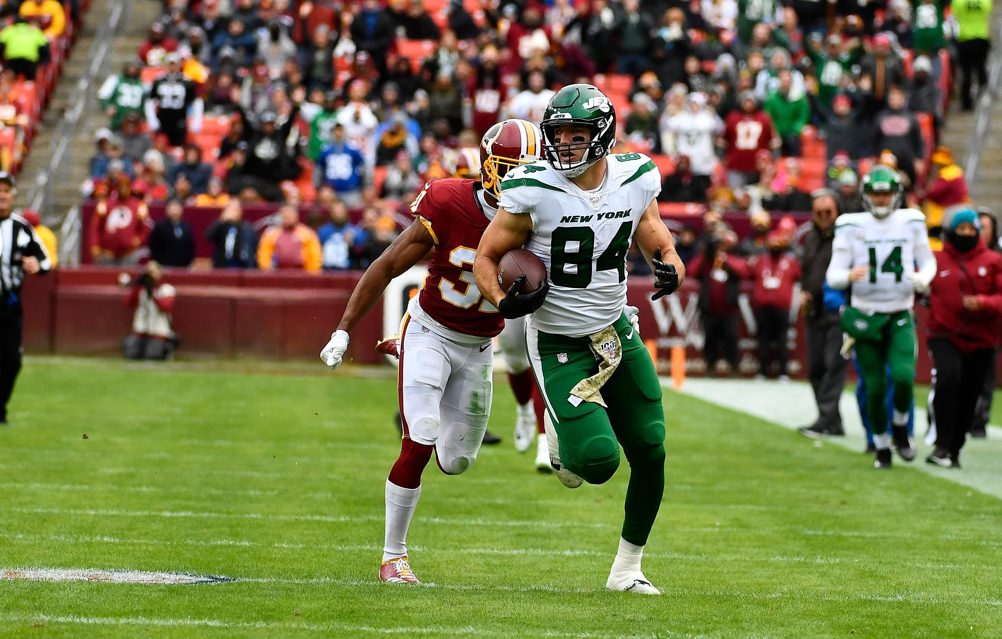 Nov 17, 2019; Landover, MD, USA; New York Jets tight end Ryan Griffin (84) runs after a catch against the Washington Redskins during the first half at FedExField. Mandatory Credit: Brad Mills-USA TODAY Sports / Brad Mills