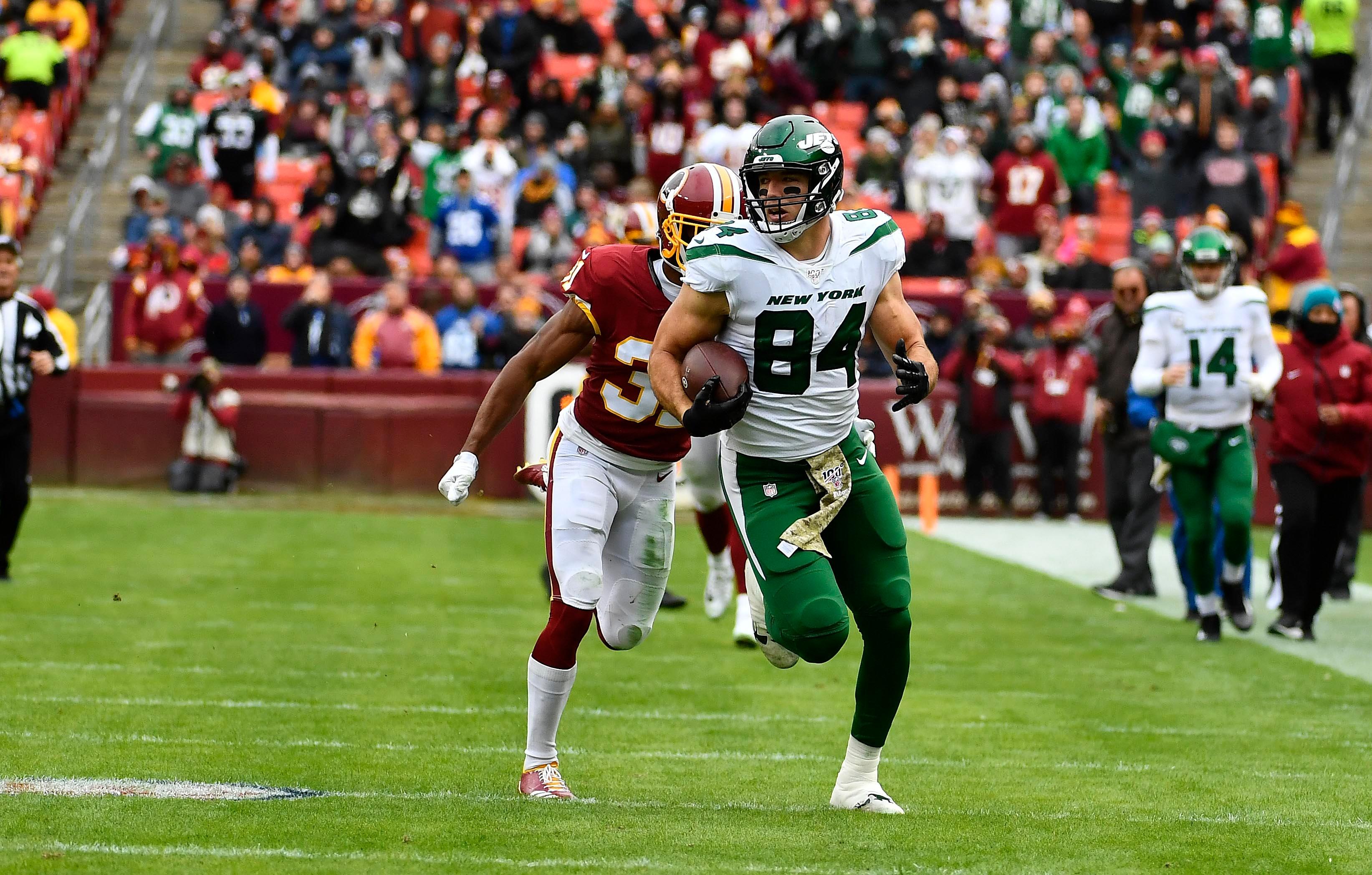 Nov 17, 2019; Landover, MD, USA; New York Jets tight end Ryan Griffin (84) runs after a catch against the Washington Redskins during the first half at FedExField. Mandatory Credit: Brad Mills-USA TODAY Sports