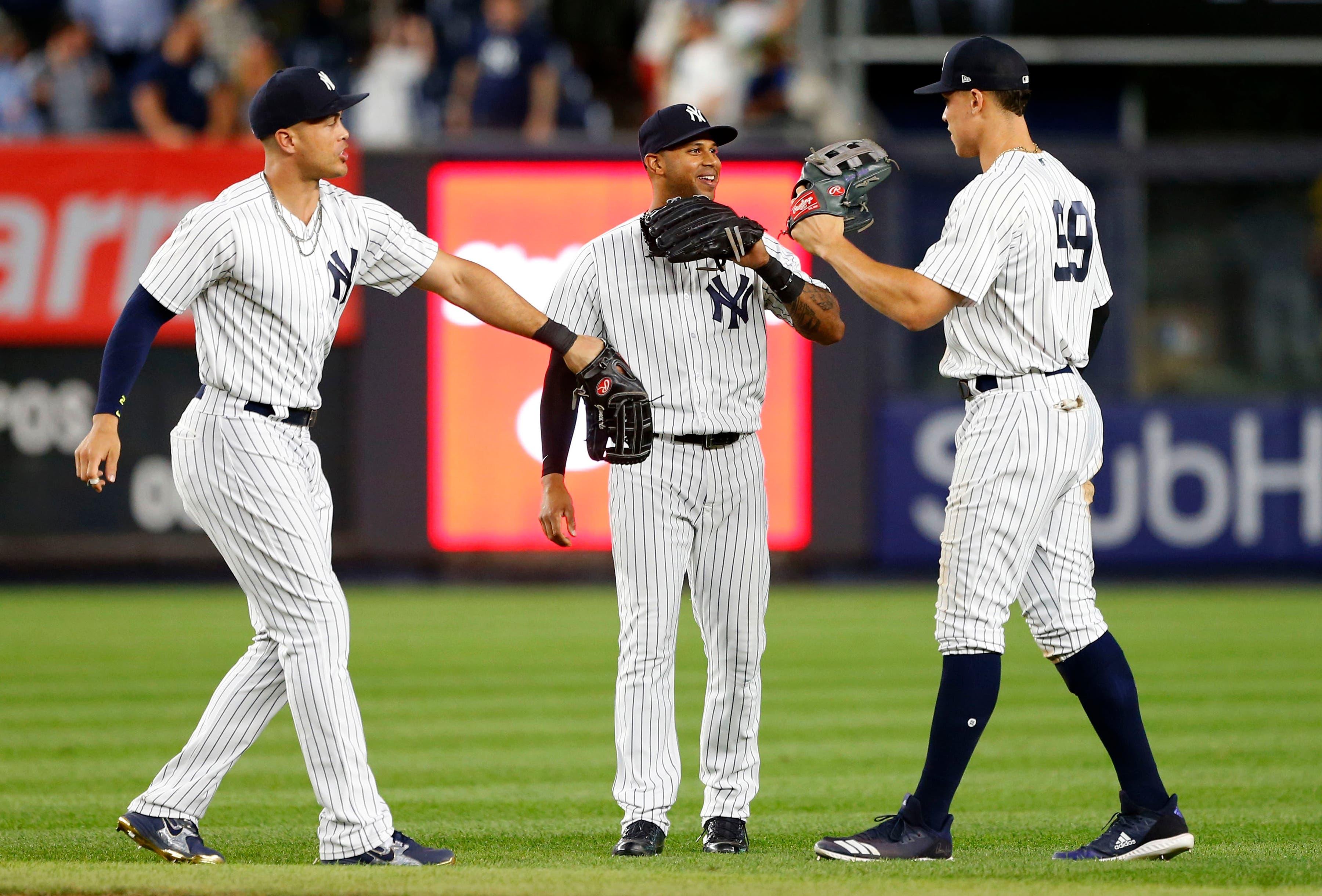 Giancarlo Stanton (27) Aaron Hicks (31) Aaron Judge (99) Mandatory Credit: Noah K. Murray-USA TODAY Sports / Noah K. Murray