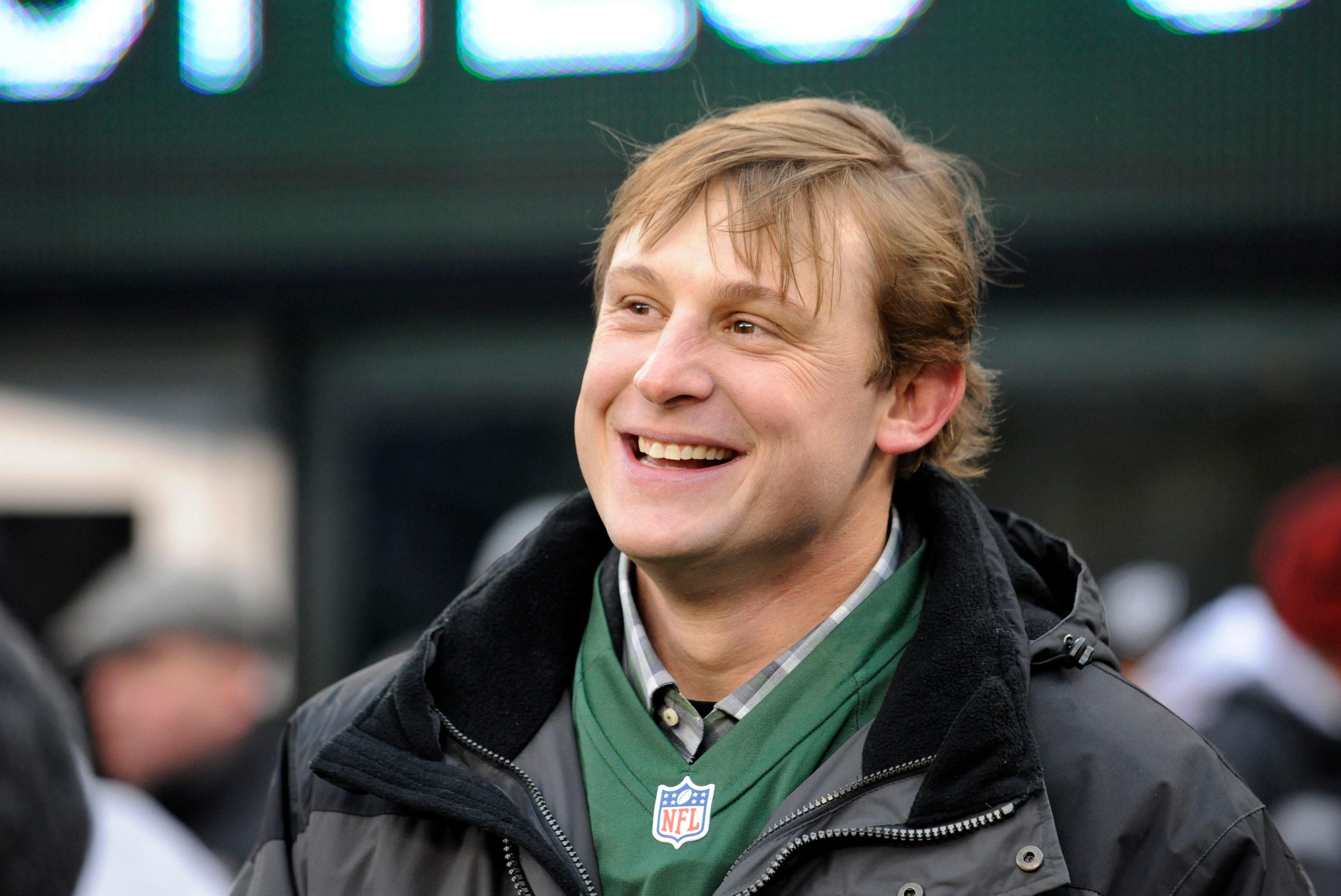 Chad Pennington smiles before a football game between the Oakland Raiders and the Jets. / AP