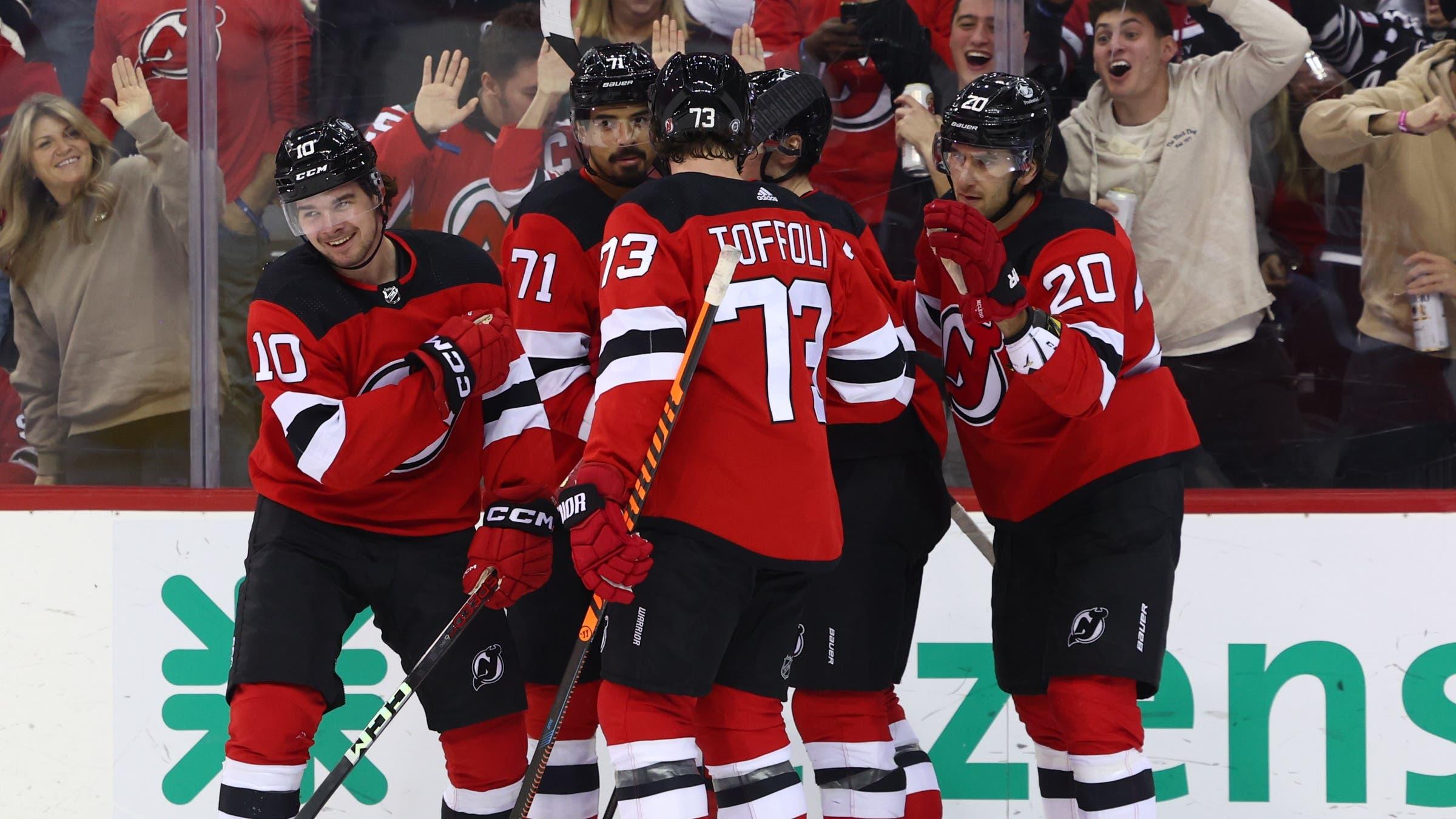 New Jersey Devils right wing Alexander Holtz (10) celebrates his goal against the Chicago Blackhawks during the second period at Prudential Center / Ed Mulholland - USA TODAY Sports