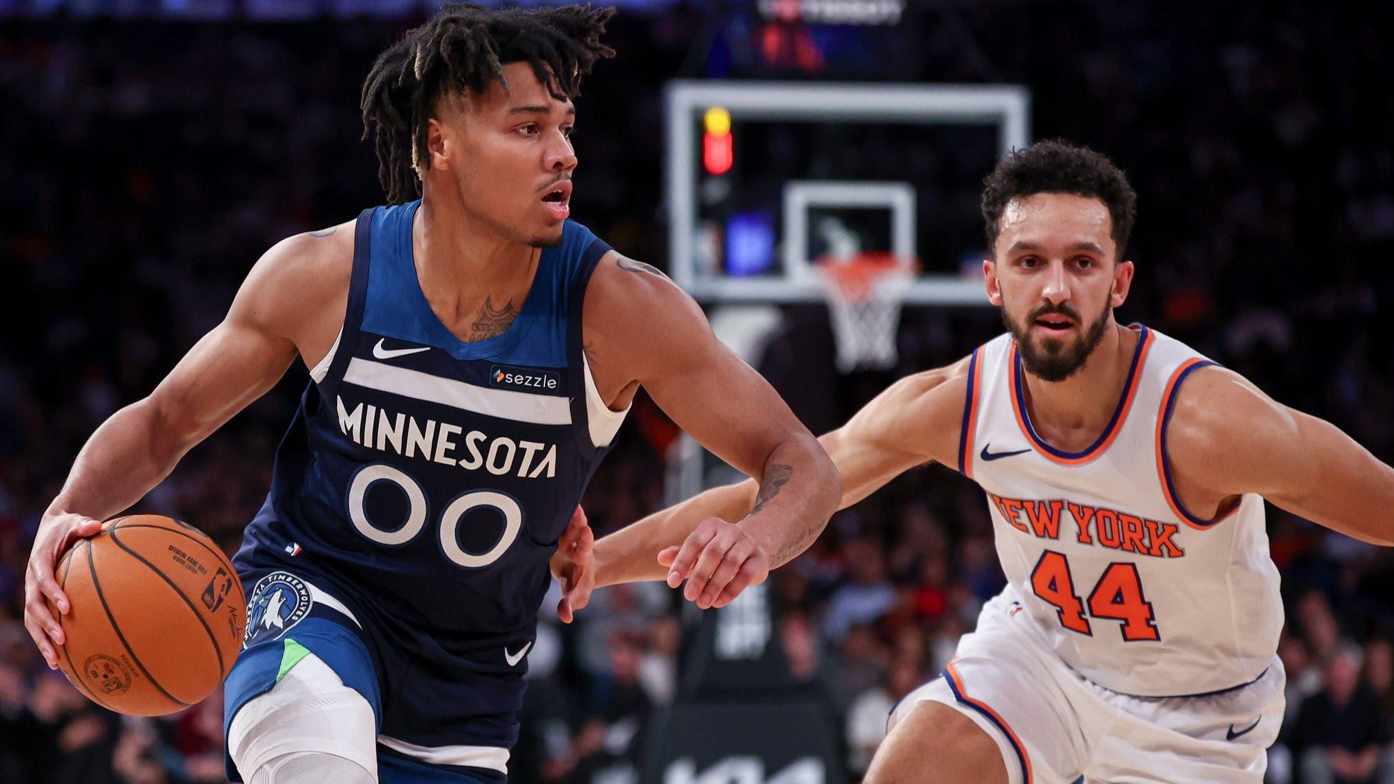 Oct 13, 2024; New York, New York, USA; Minnesota Timberwolves guard Terrence Shannon Jr. (00) dribbles in front of New York Knicks guard Landry Shamet (44) during the second half at Madison Square Garden.