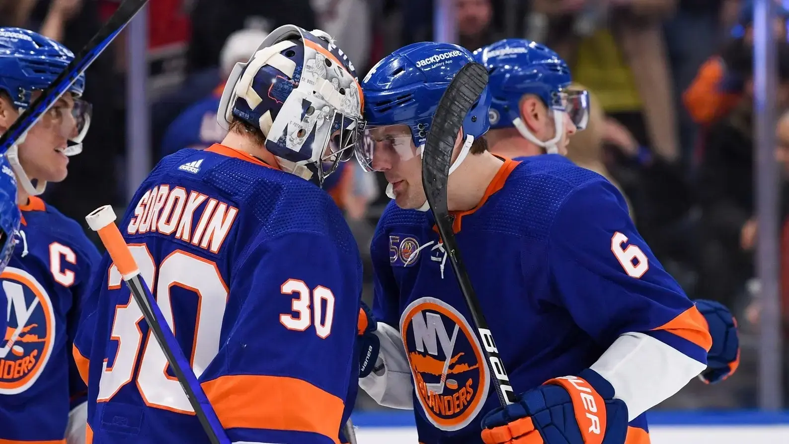 New York Islanders defenseman Ryan Pulock congratulates New York Islanders goaltender Ilya Sorokin on the 3-2 victory over Buffalo Sabres. / Dennis Schneidler-USA TODAY Sports