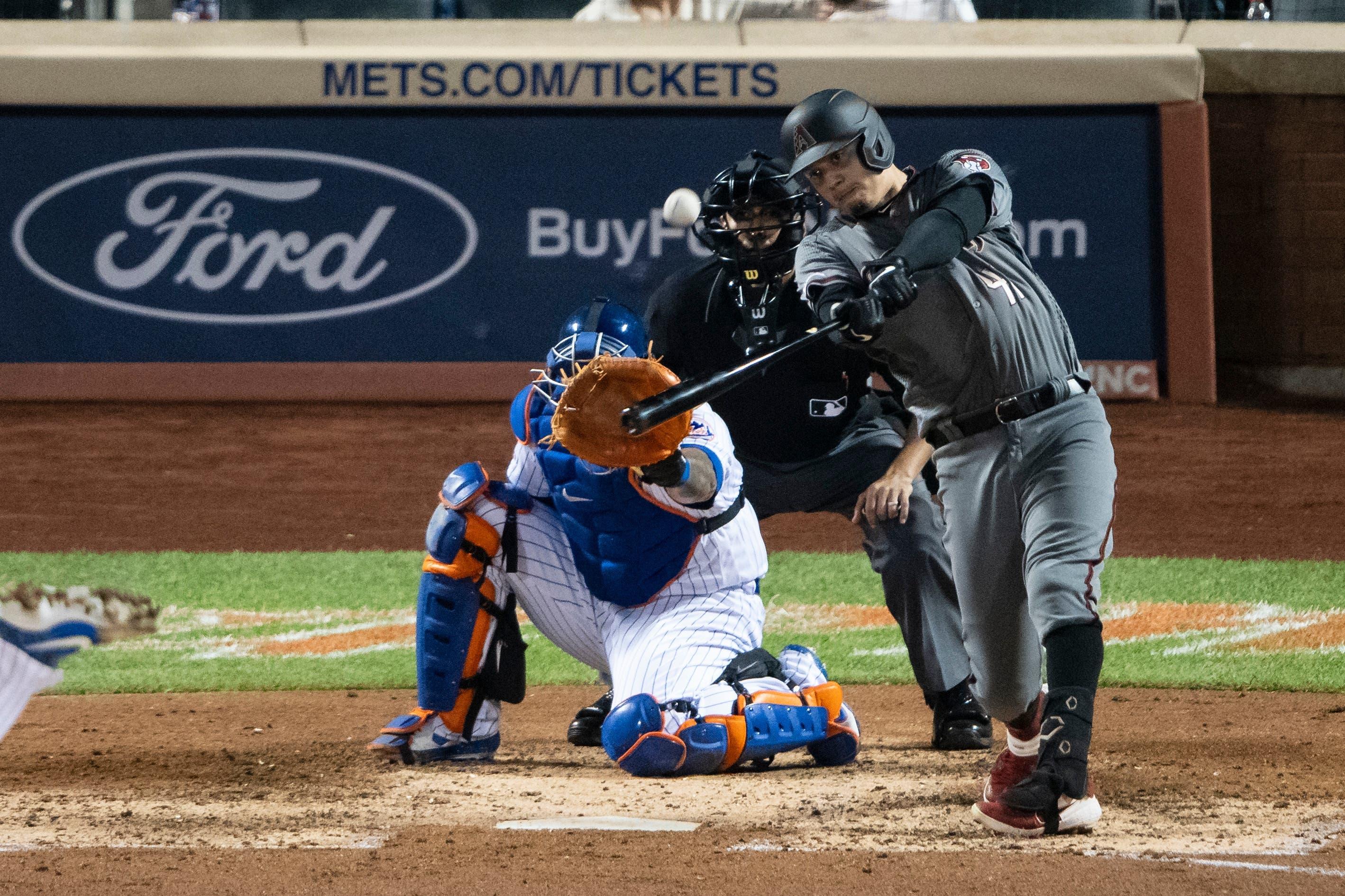 Sep 9, 2019; New York City, NY, USA; Arizona Diamondbacks second baseman Wilmer Flores (41) hits a home run during the fifth inning against the New York Mets at Citi Field. Mandatory Credit: Gregory J. Fisher-USA TODAY Sports / Gregory Fisher