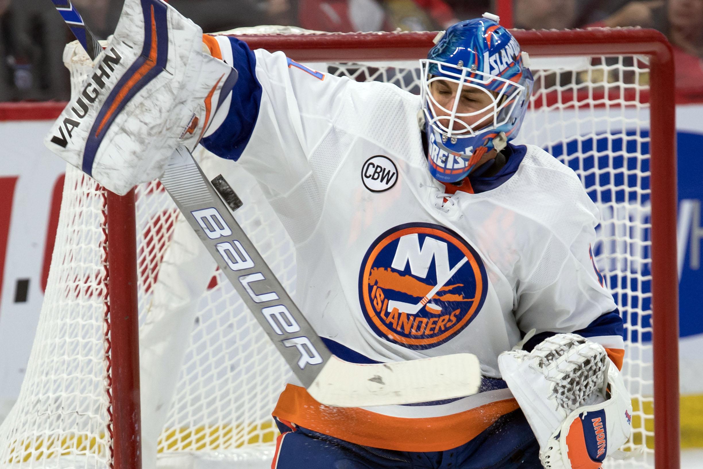 Mar 7, 2019; Ottawa, Ontario, CAN; New York Islanders goalie Thomas Greiss (1) makes a save in the second period against the Ottawa Senators at the Canadian Tire Centre. Mandatory Credit: Marc DesRosiers-USA TODAY Sports