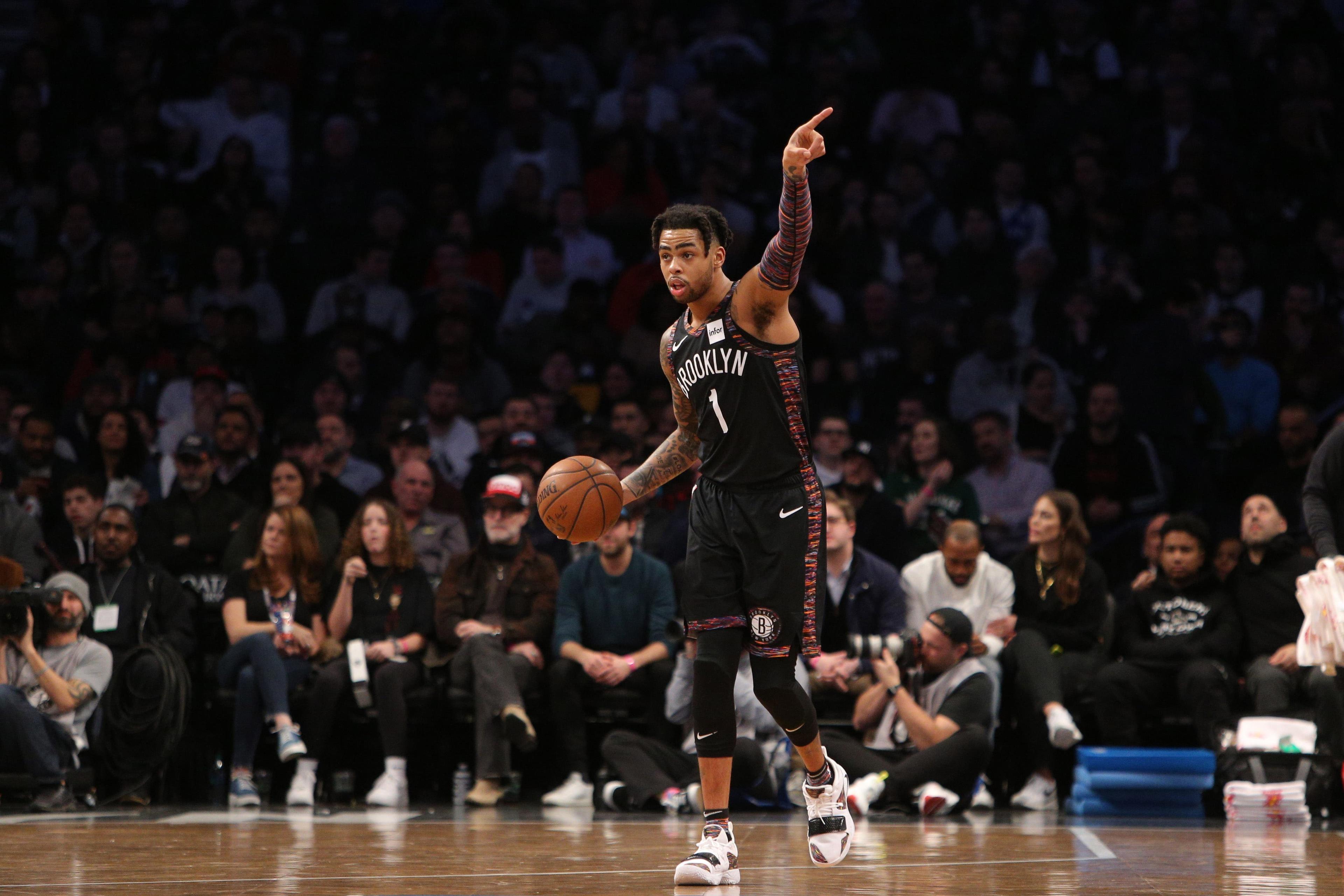 Brooklyn Nets point guard D'Angelo Russell directs his teammates during the second quarter against the Milwaukee Bucks at Barclays Center. / Brad Penner/USA TODAY Sports