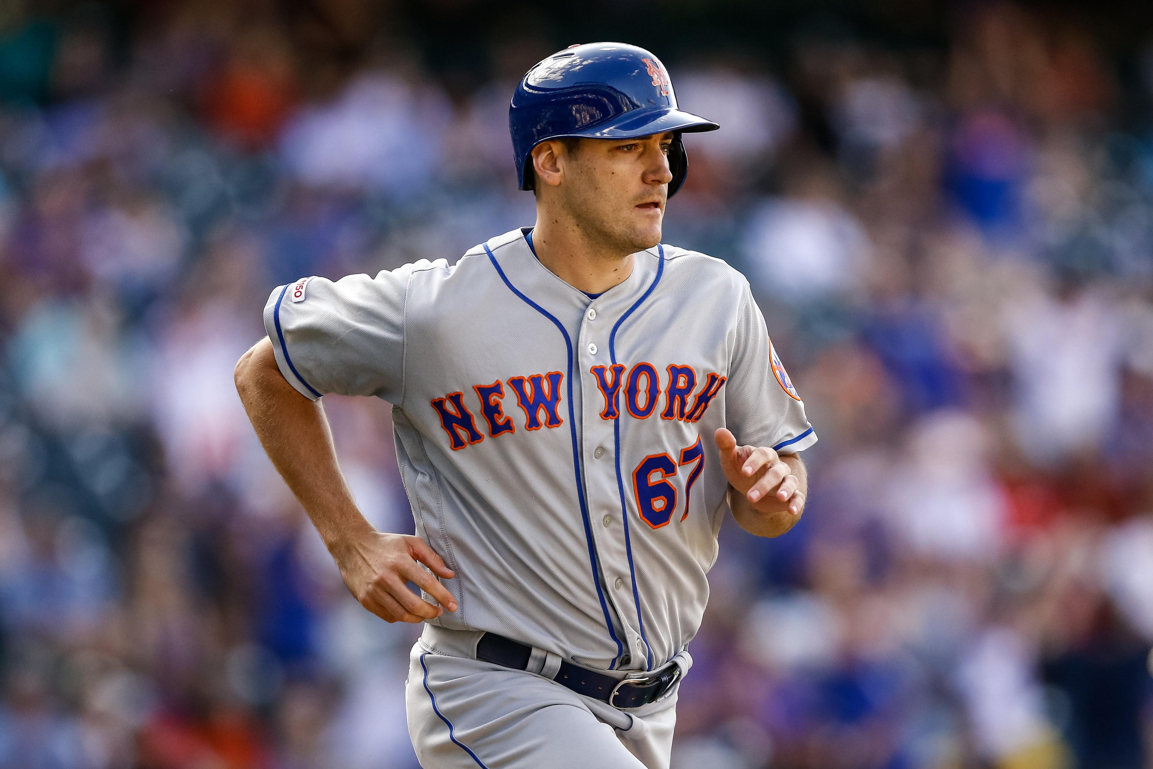 Sep 18, 2019; Denver, CO, USA; New York Mets relief pitcher Seth Lugo (67) runs to first on an RBI single in the ninth inning against the Colorado Rockies at Coors Field. Mandatory Credit: Isaiah J. Downing-USA TODAY Sports