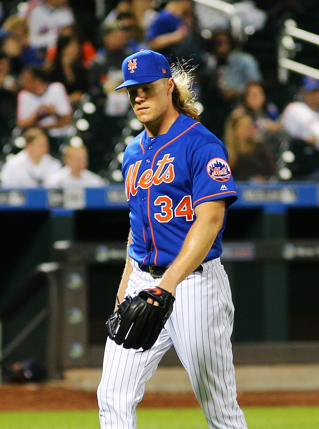 May 24, 2019; New York City, NY, USA; New York Mets starting pitcher Noah Syndergaard (34) leaves the field after being taken out of the game against the Detroit Tigers during the sixth inning at Citi Field. Mandatory Credit: Andy Marlin-USA TODAY Sports