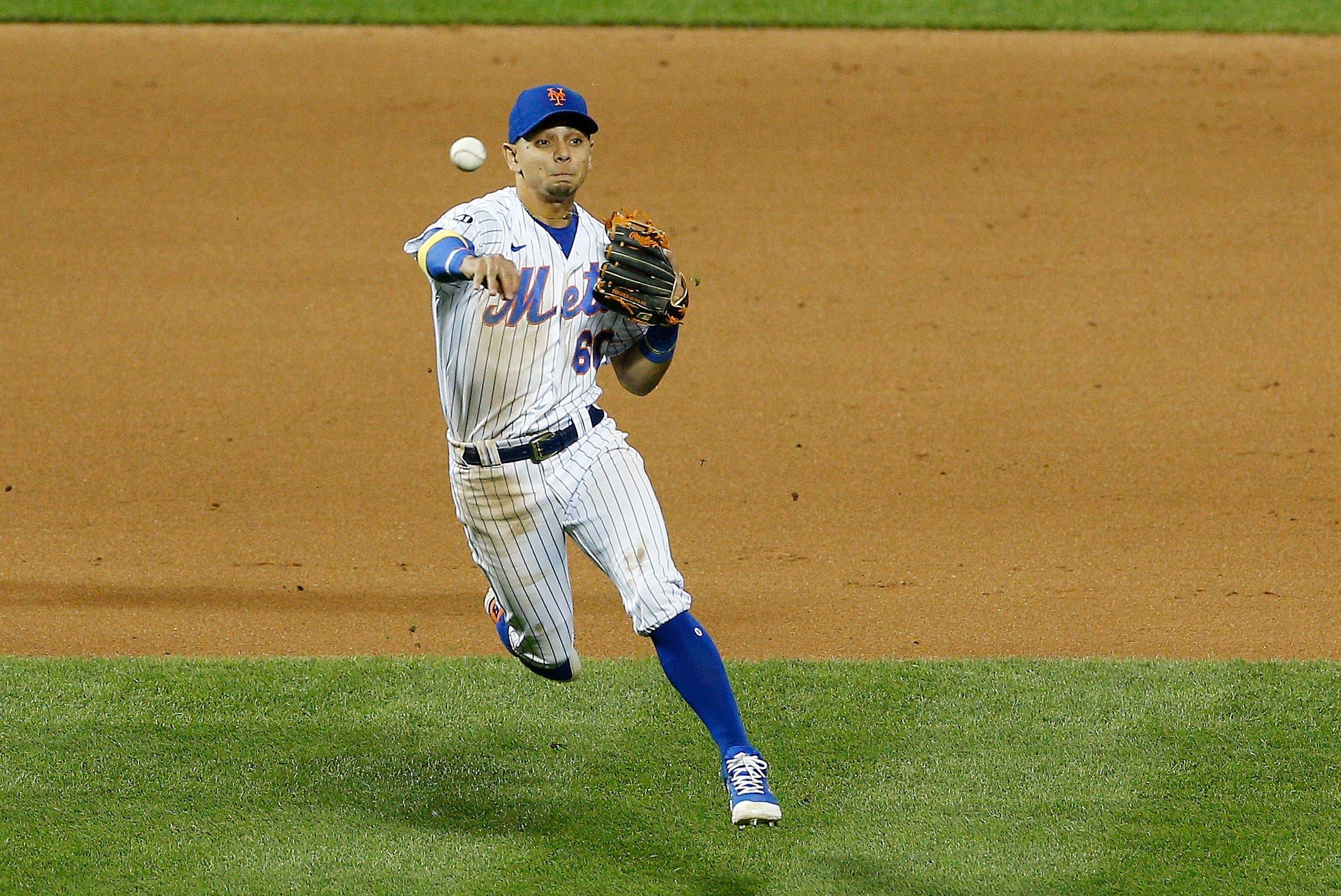 Andres Gimenez throws on the run / USA Today