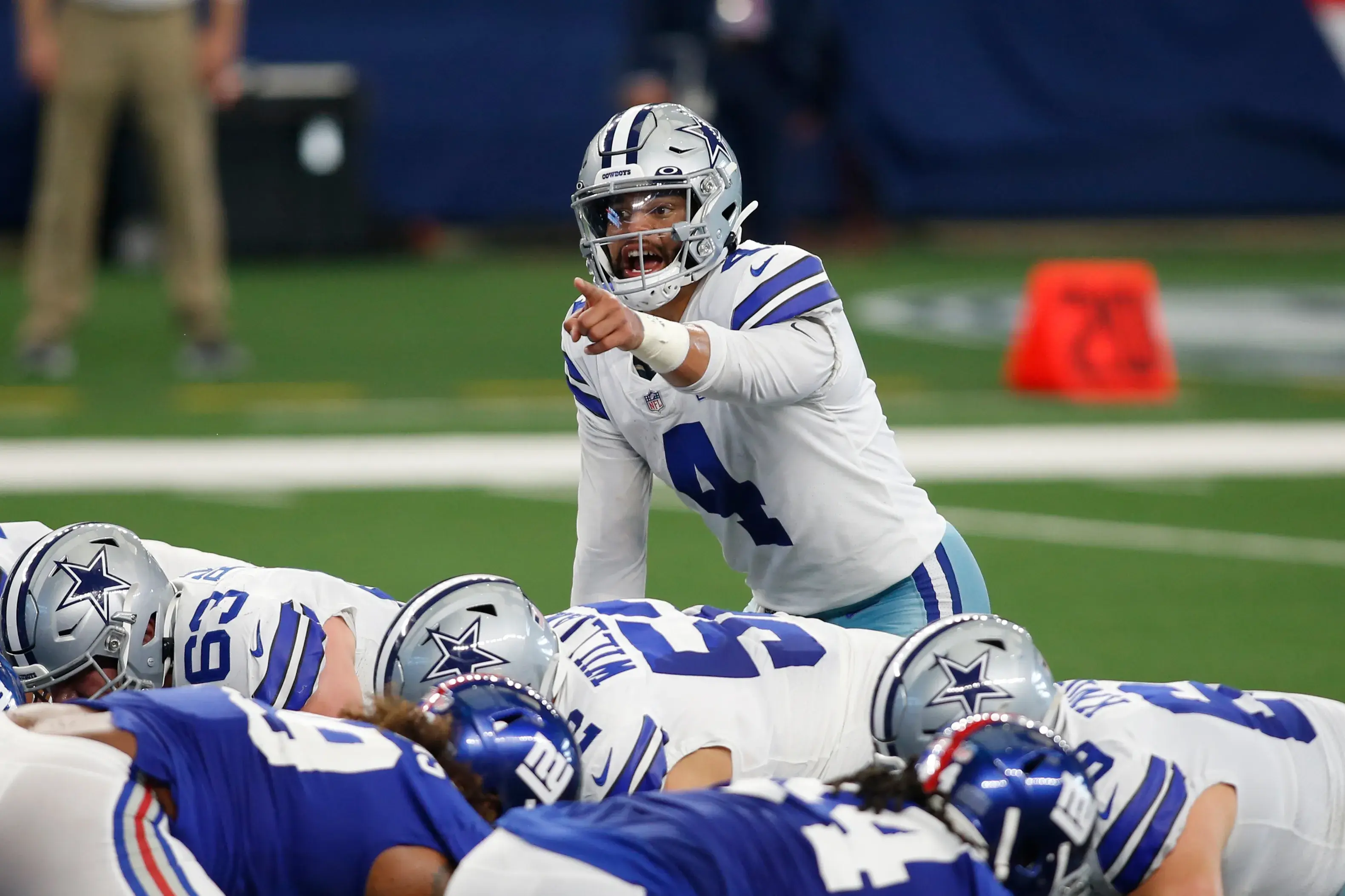 Oct 11, 2020; Arlington, Texas, USA; Dallas Cowboys quarterback Dak Prescott (4) calls a play in the second quarter against the New York Giants at AT&T Stadium. Mandatory Credit: Tim Heitman-USA TODAY Sports / © Tim Heitman-USA TODAY Sports