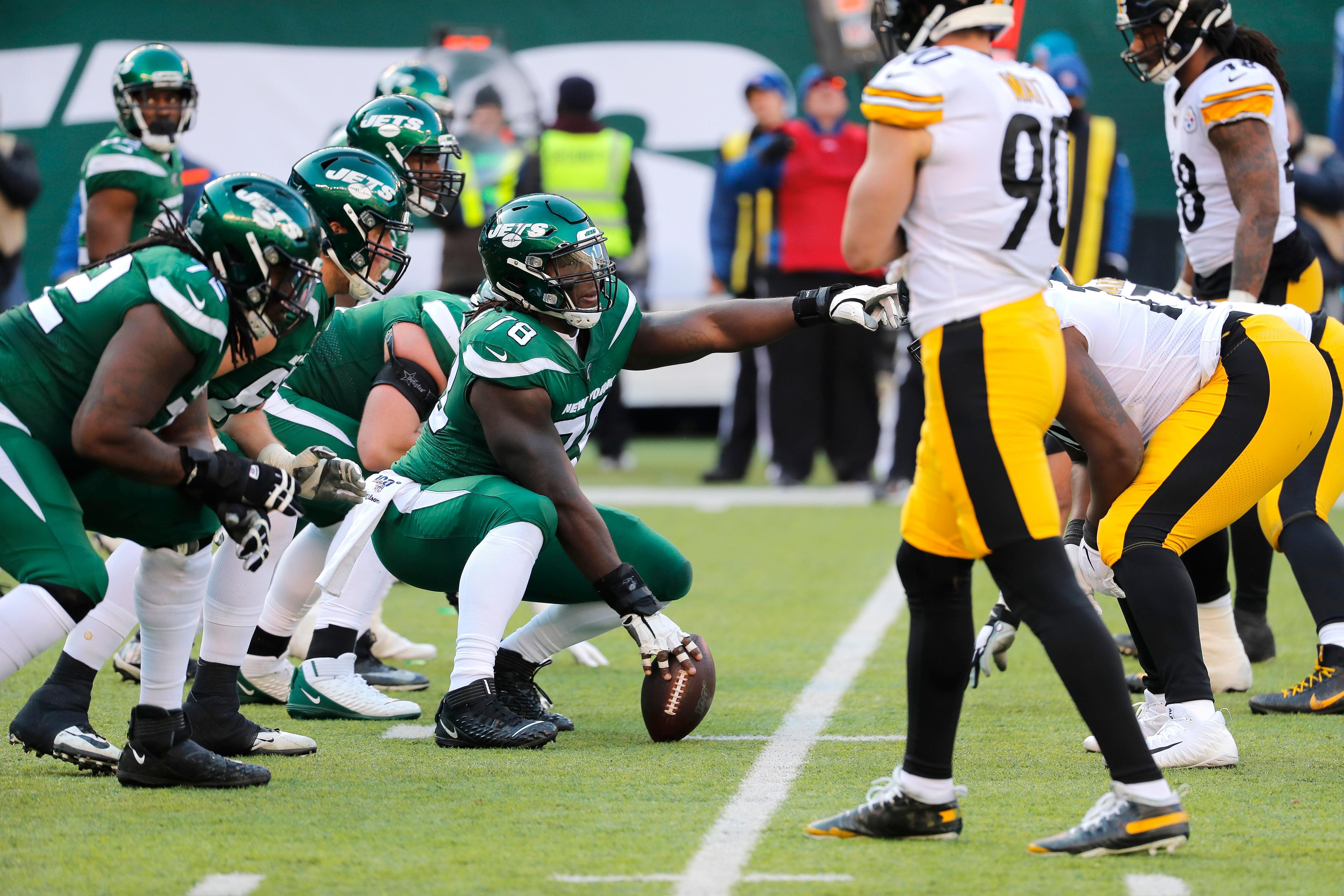 New York Jets center Jonotthan Harrison (78) lines up in the first half of an NFL football game against the Pittsburgh Steelers, Sunday, Dec. 22, 2019, in East Rutherford, N.J. (AP Photo/Seth Wenig) 