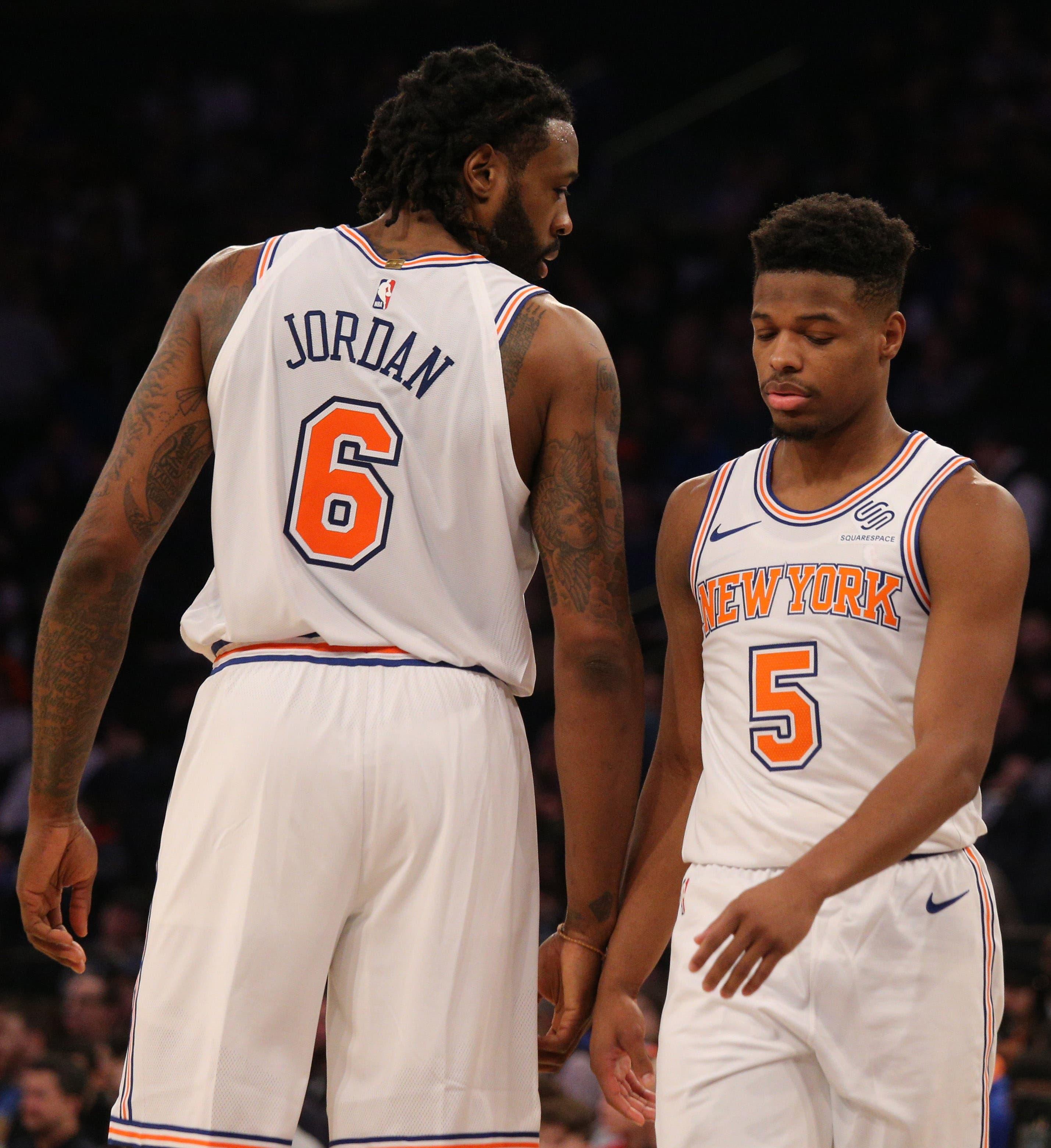 Feb 3, 2019; New York, NY, USA; New York Knicks center DeAndre Jordan (6) talks to guard Dennis Smith Jr. (5) during the second quarter against the Memphis Grizzlies at Madison Square Garden. Mandatory Credit: Brad Penner-USA TODAY Sports / Brad Penner