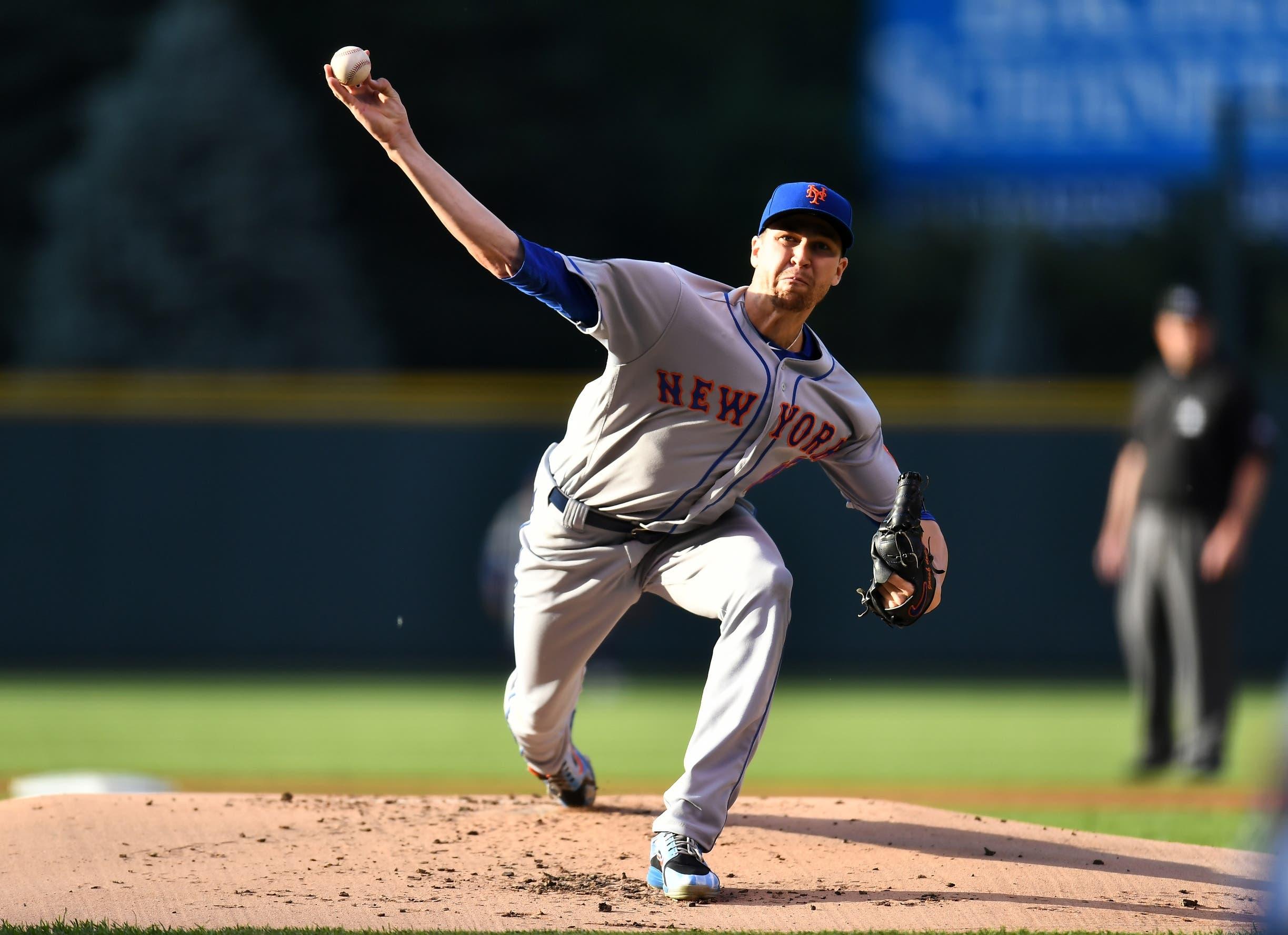 Jun 18, 2018; Denver, CO, USA; New York Mets starting pitcher Jacob deGrom (48) delivers a pitch in the first inning against the Colorado Rockies at Coors Field. Mandatory Credit: Ron Chenoy-USA TODAY Sports / Ron Chenoy