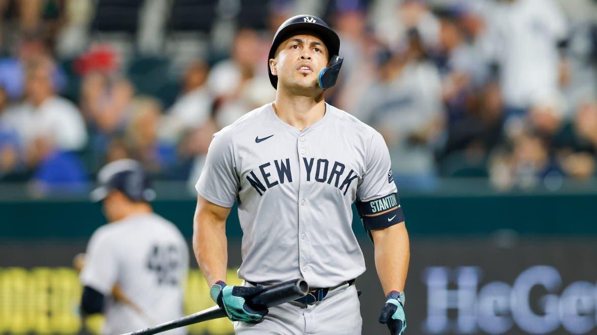 New York Yankees designated hitter Giancarlo Stanton (27) heads to the dugout after striking out during the fifth inning against the Texas Rangers at Globe Life Field. / Andrew Dieb-Imagn Images