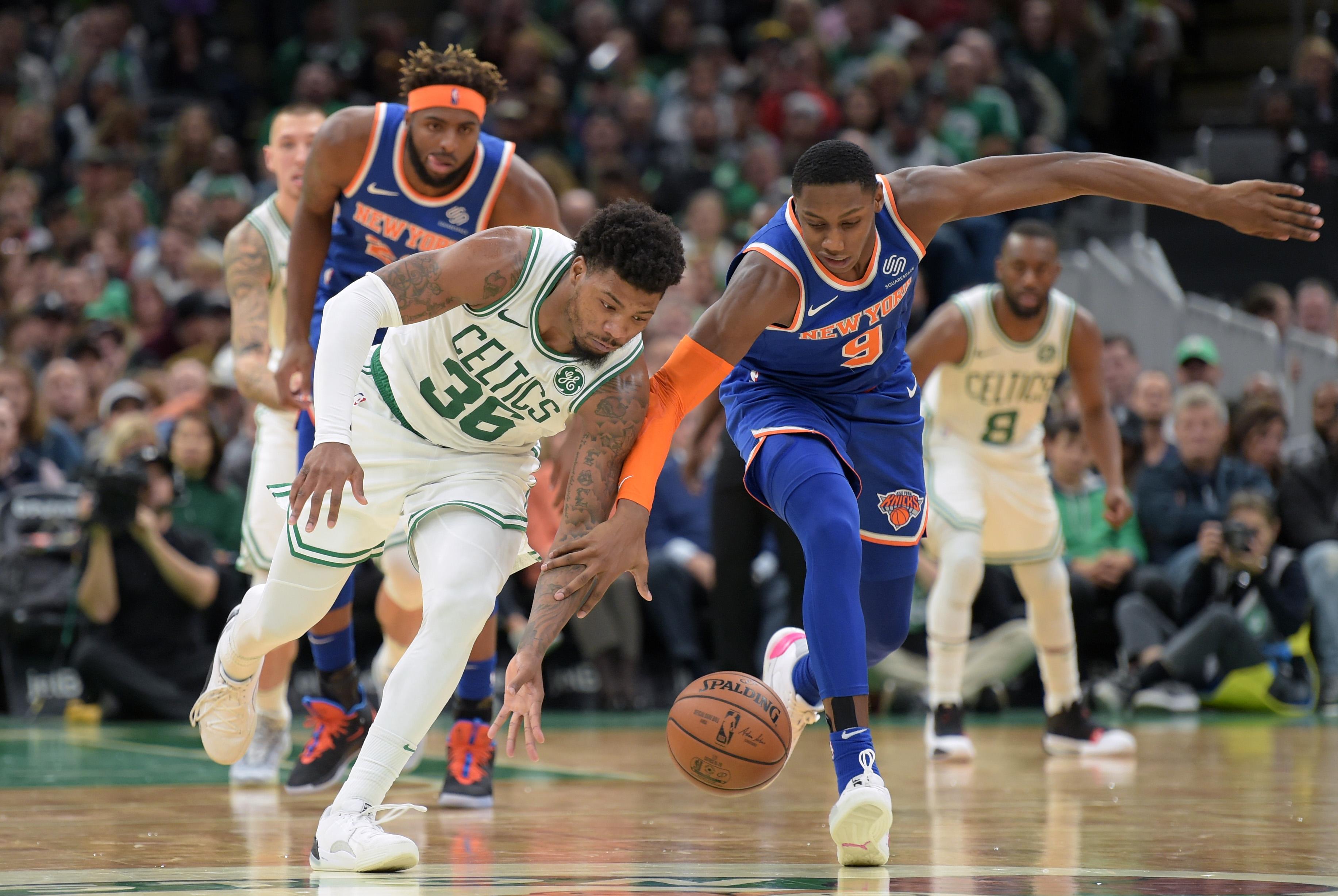 Nov 1, 2019; Boston, MA, USA; Boston Celtics guard Marcus Smart (36) and New York Knicks forward RJ Barrett (9) battle for a loose ball during the second half at TD Garden. Mandatory Credit: Bob DeChiara-USA TODAY Sports