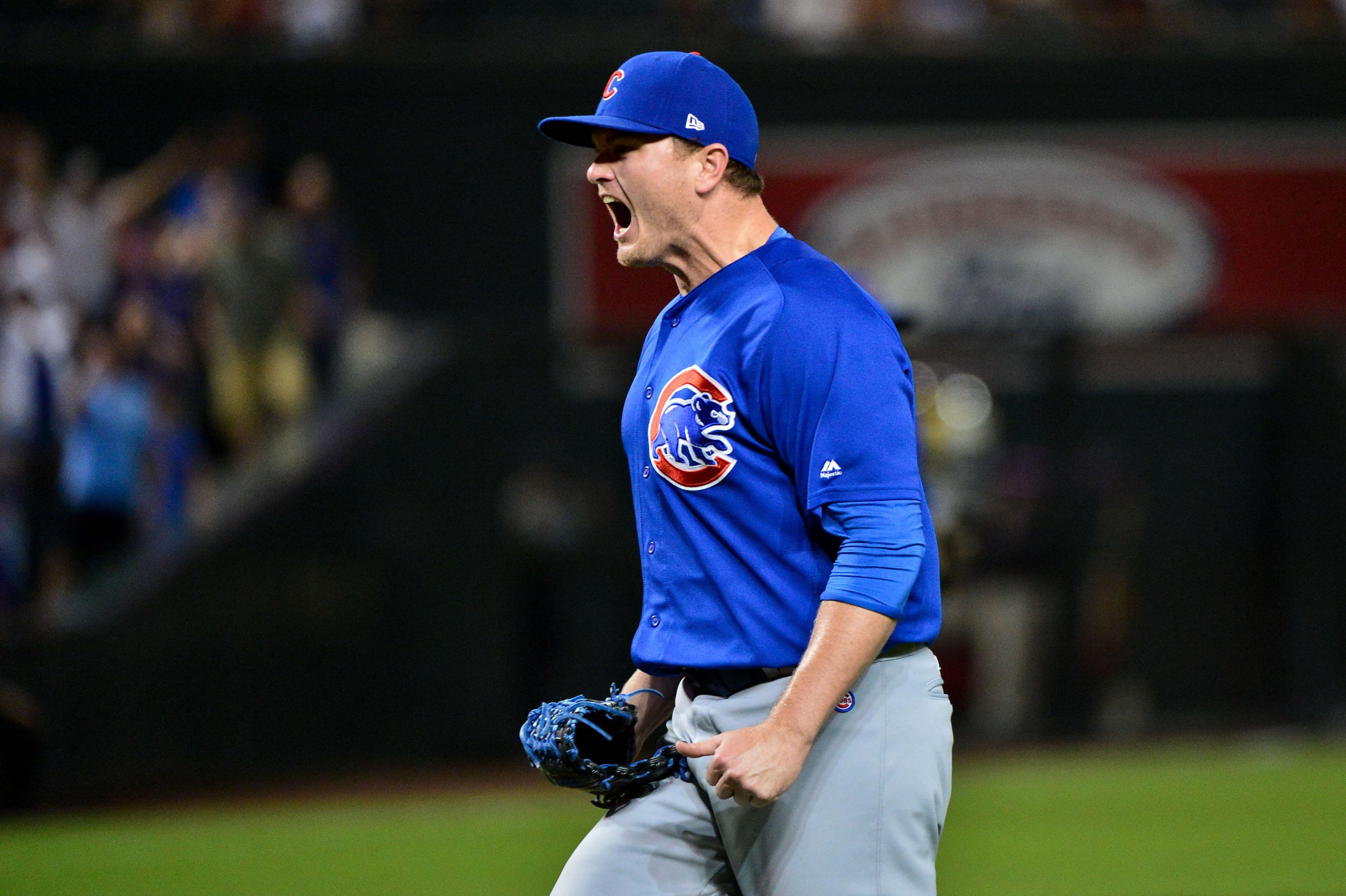 Sep 17, 2018; Phoenix, AZ, USA; Chicago Cubs relief pitcher Justin Wilson (37) reacts after beating the Arizona Diamondbacks 5-1 at Chase Field. Mandatory Credit: Matt Kartozian-USA TODAY Sports