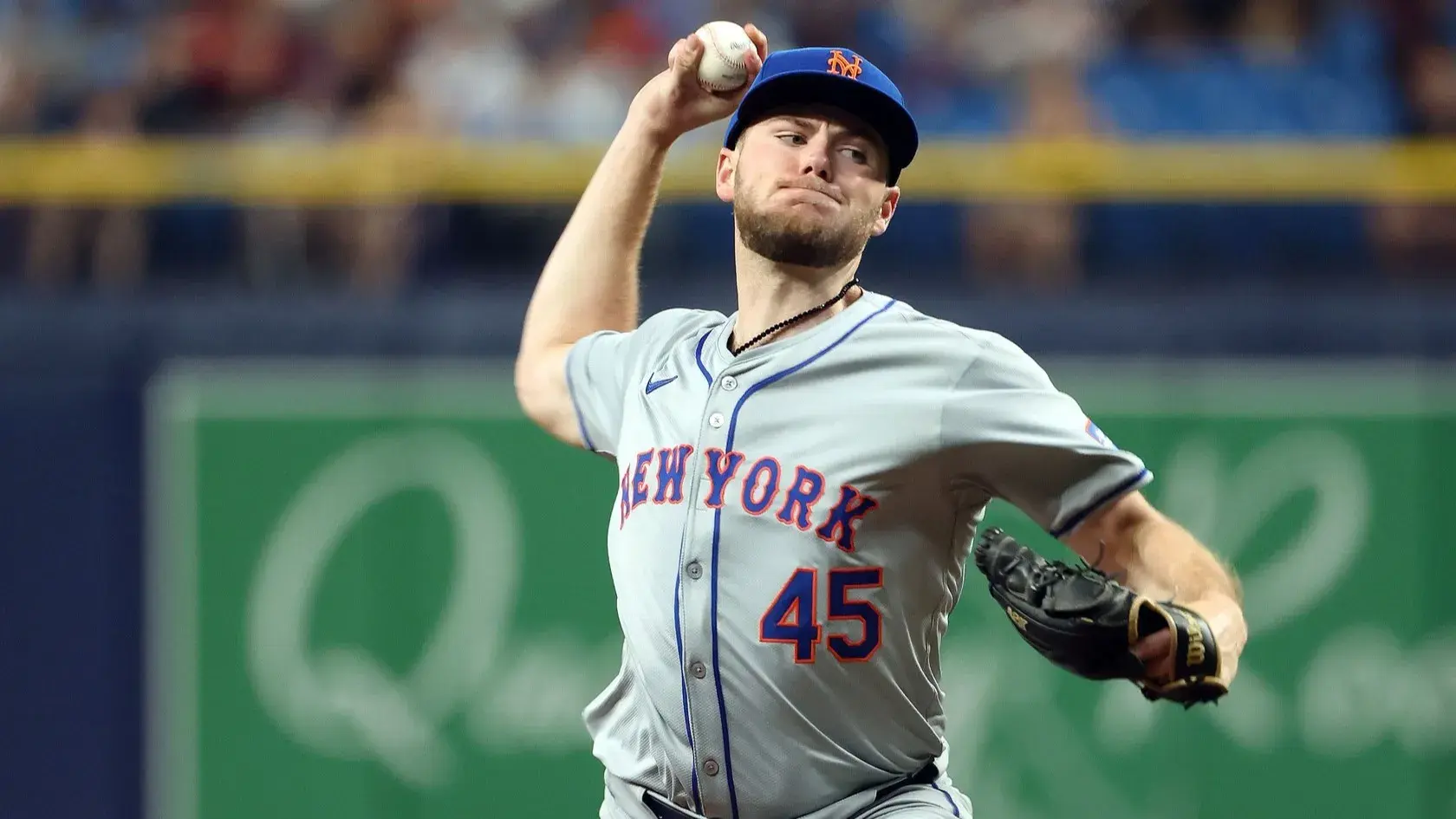 May 4, 2024; St. Petersburg, Florida, USA; New York Mets starting pitcher Christian Scott (45) throws a pitch against the Tampa Bay Rays during the third inning at Tropicana Field. / Kim Klement Neitzel-USA TODAY Sports