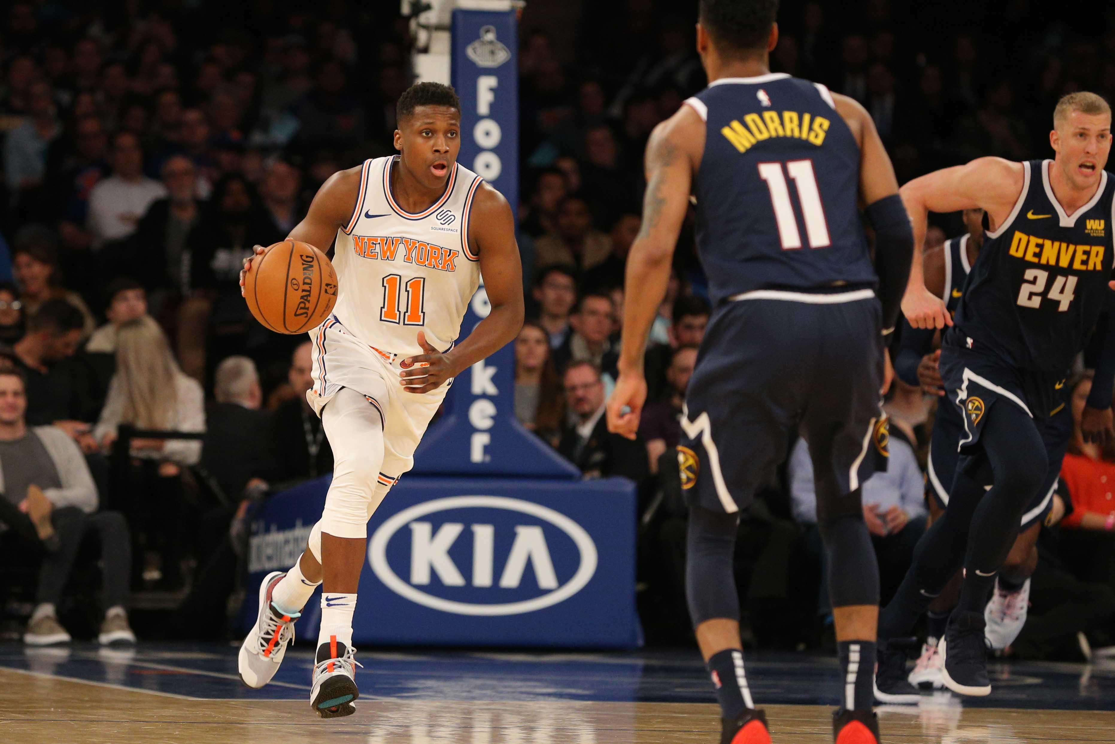 Mar 22, 2019; New York, NY, USA; New York Knicks point guard Frank Ntilikina (11) brings the ball up court against the Denver Nuggets during the fourth quarter at Madison Square Garden. Mandatory Credit: Brad Penner-USA TODAY Sports / Brad Penner